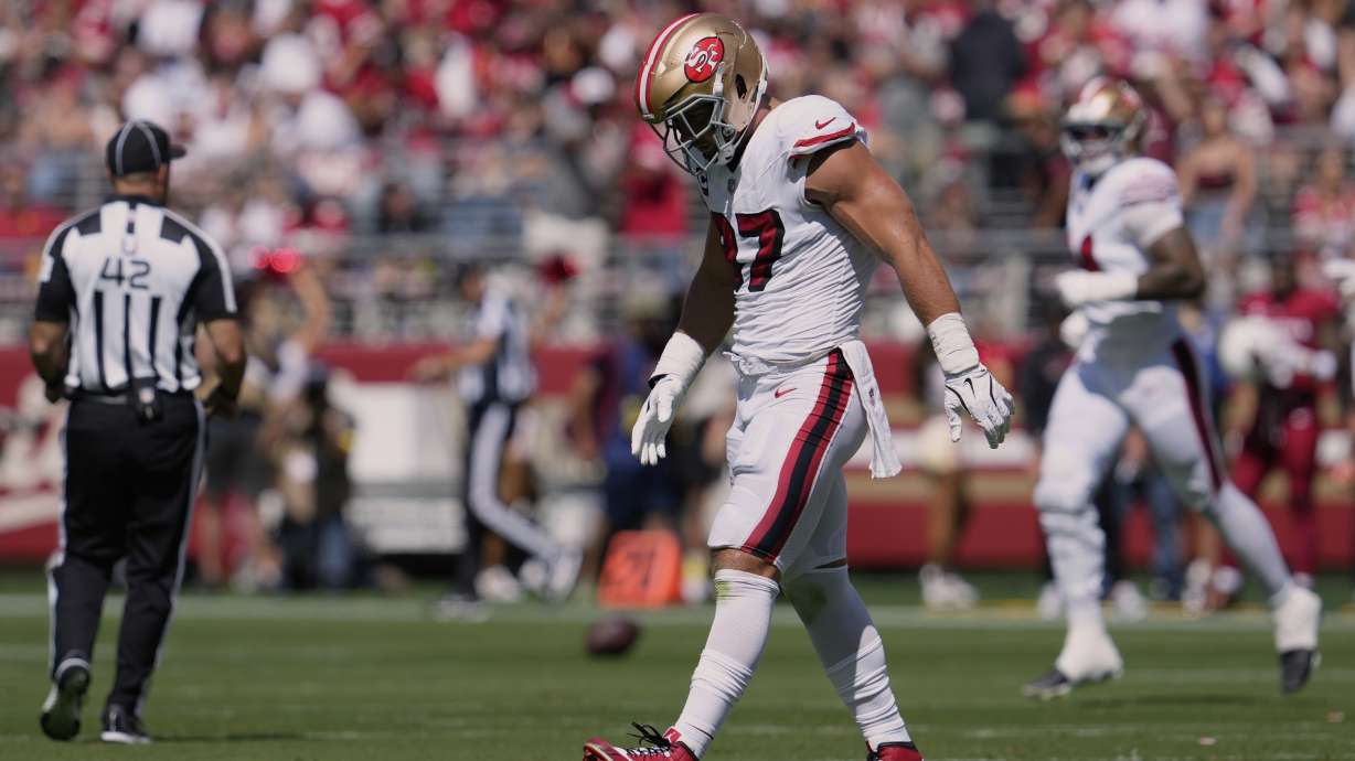 San Francisco 49ers defensive end Nick Bosa walks off the field during the first half of an NFL football game against the Arizona Cardinals, Sunday, Sept. 21, 2025, in Santa Clara, Calif.