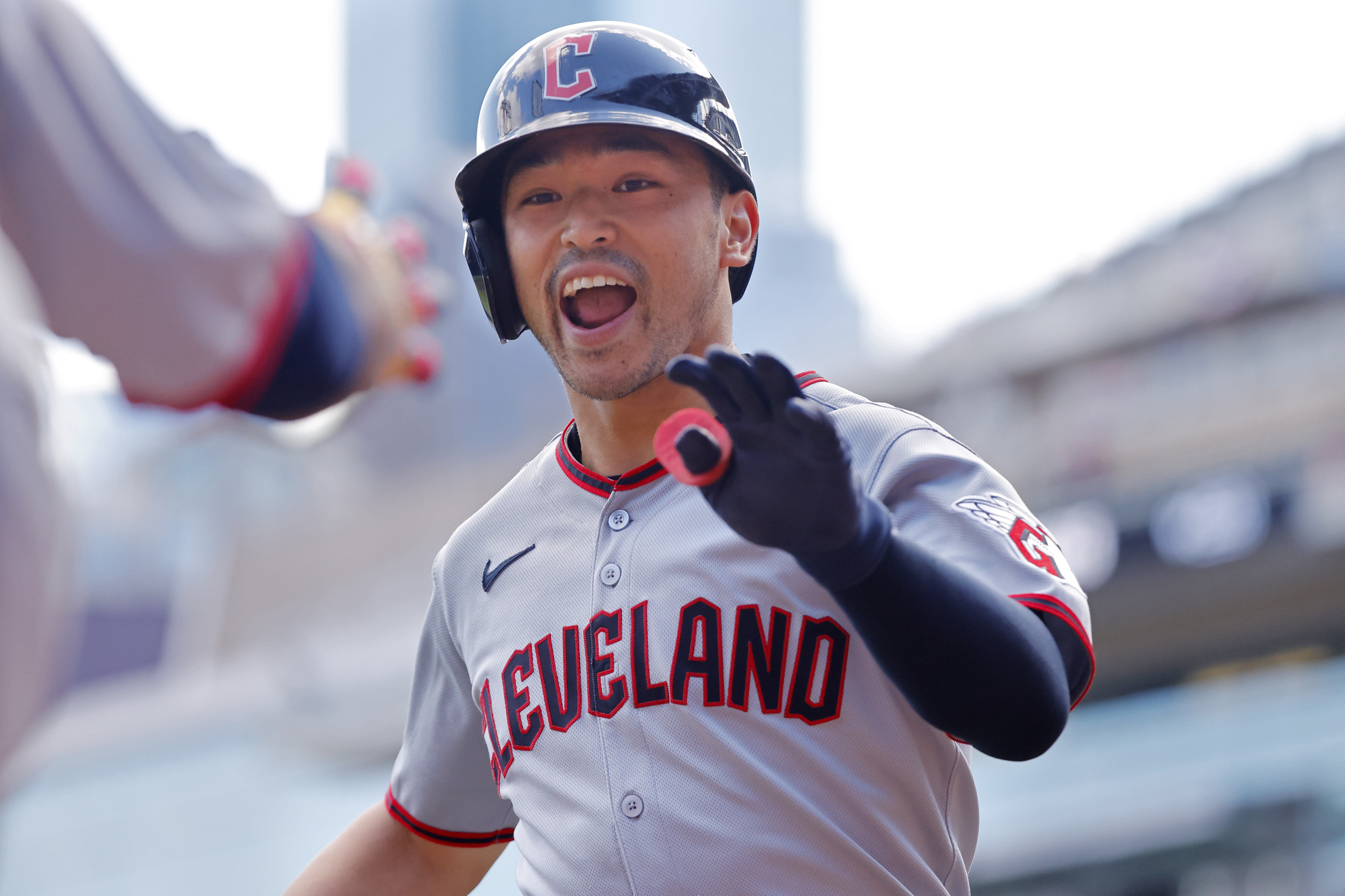 Cleveland Guardians' Steven Kwan celebrates after his leadoff home run against the Minnesota Twins in the first inning of a baseball game Sunday, Sept. 21, 2025, in Minneapolis. 