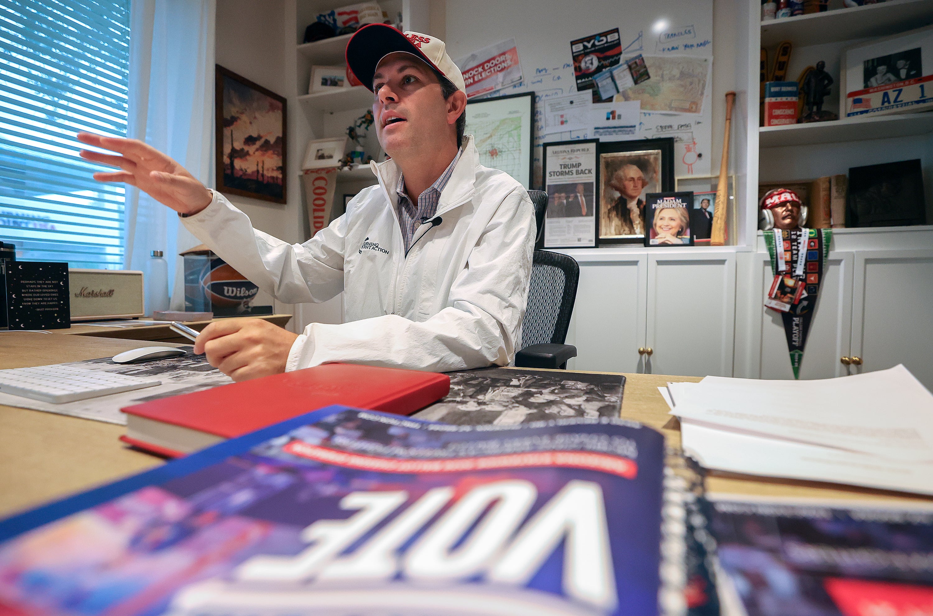 Tyler Bowyer, Turning Point Action chief operating officer, answers interview questions in his office at Turning Point headquarters in Phoenix, Ariz., on Aug. 19.