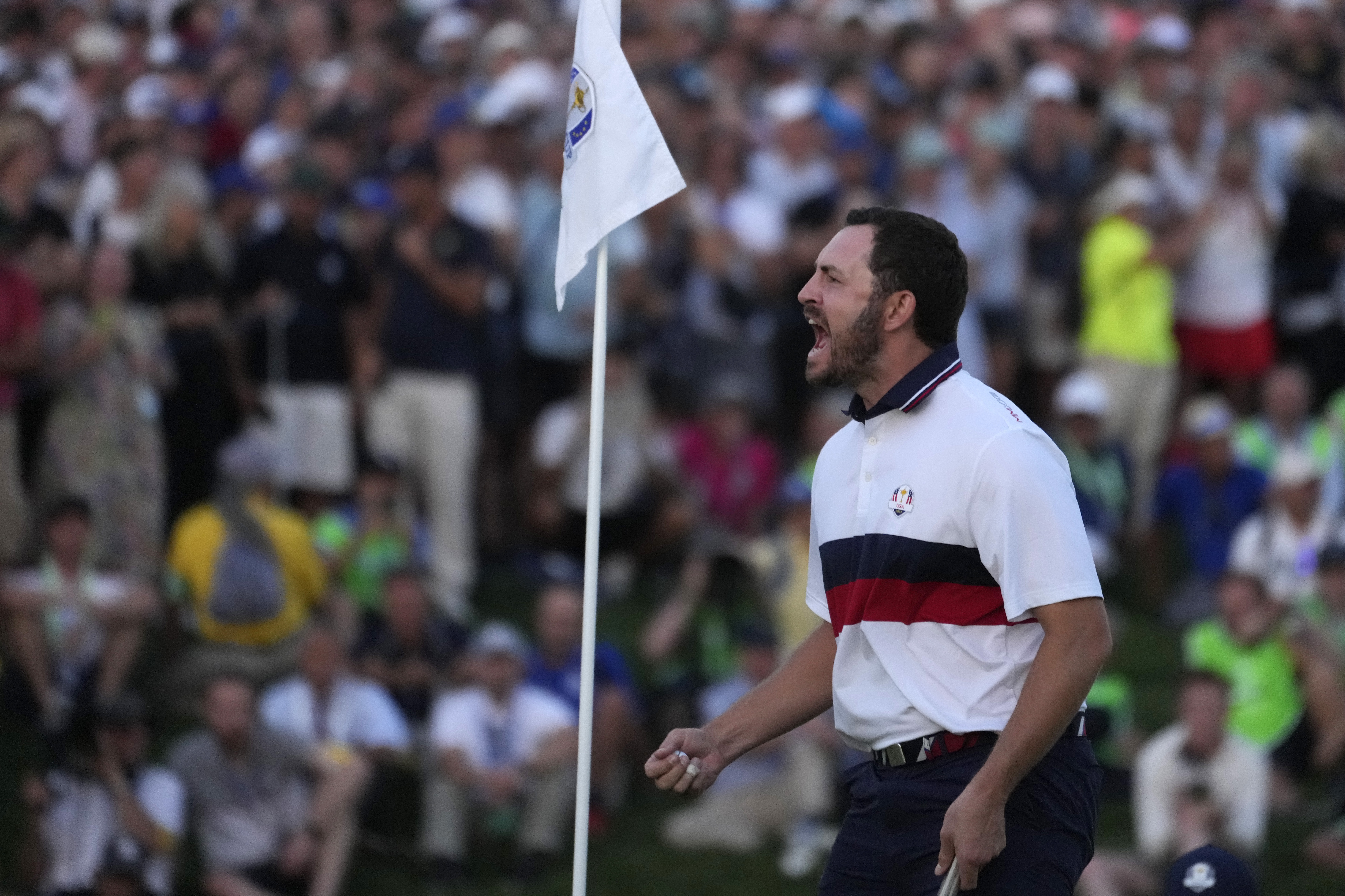 FILE - United States' Patrick Cantlay celebrates after holing his putt that led to him winning his afternoon Fourballs match on the 18th green at the Ryder Cup golf tournament at the Marco Simone Golf Club in Guidonia Montecelio, Italy, Sept. 30, 2023. 