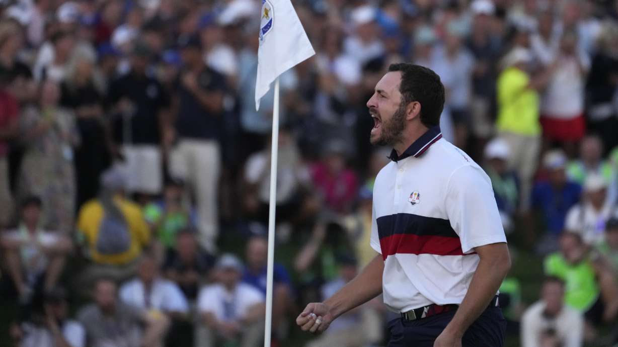 FILE - United States' Patrick Cantlay celebrates after holing his putt that led to him winning his afternoon Fourballs match on the 18th green at the Ryder Cup golf tournament at the Marco Simone Golf Club in Guidonia Montecelio, Italy, Sept. 30, 2023.