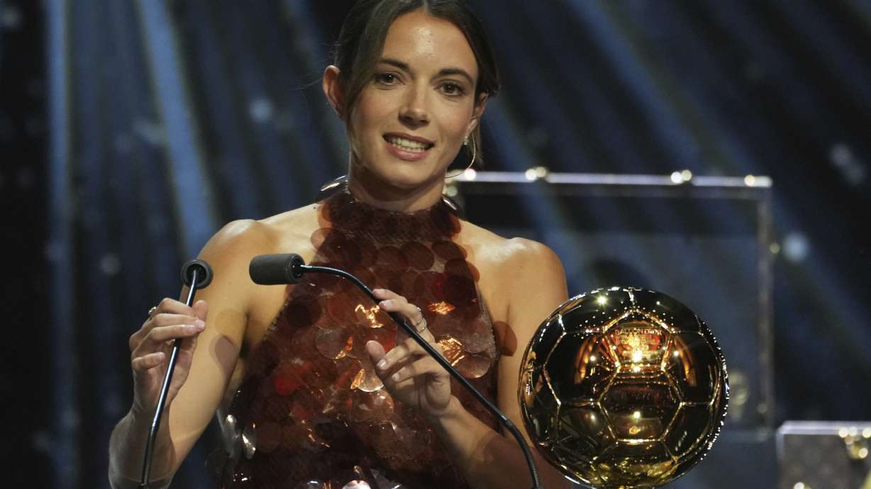Barcelona's Aitana Bonmatí receives the 2025 Women's Ballon d'Or during the 69th Ballon d'Or awards ceremony at the Theatre du Chatelet in Paris, Monday, Sept. 22, 2025.