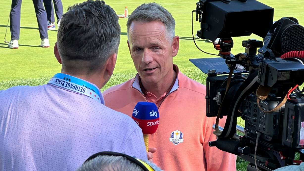 Ryder Cup European captain Luke Donald, center, speaks to British media at Bethpage Black in Farmingdale, N.Y., Monday, Sept. 22, 2025, ahead of the upcoming Ryder Cup golf tournament. .