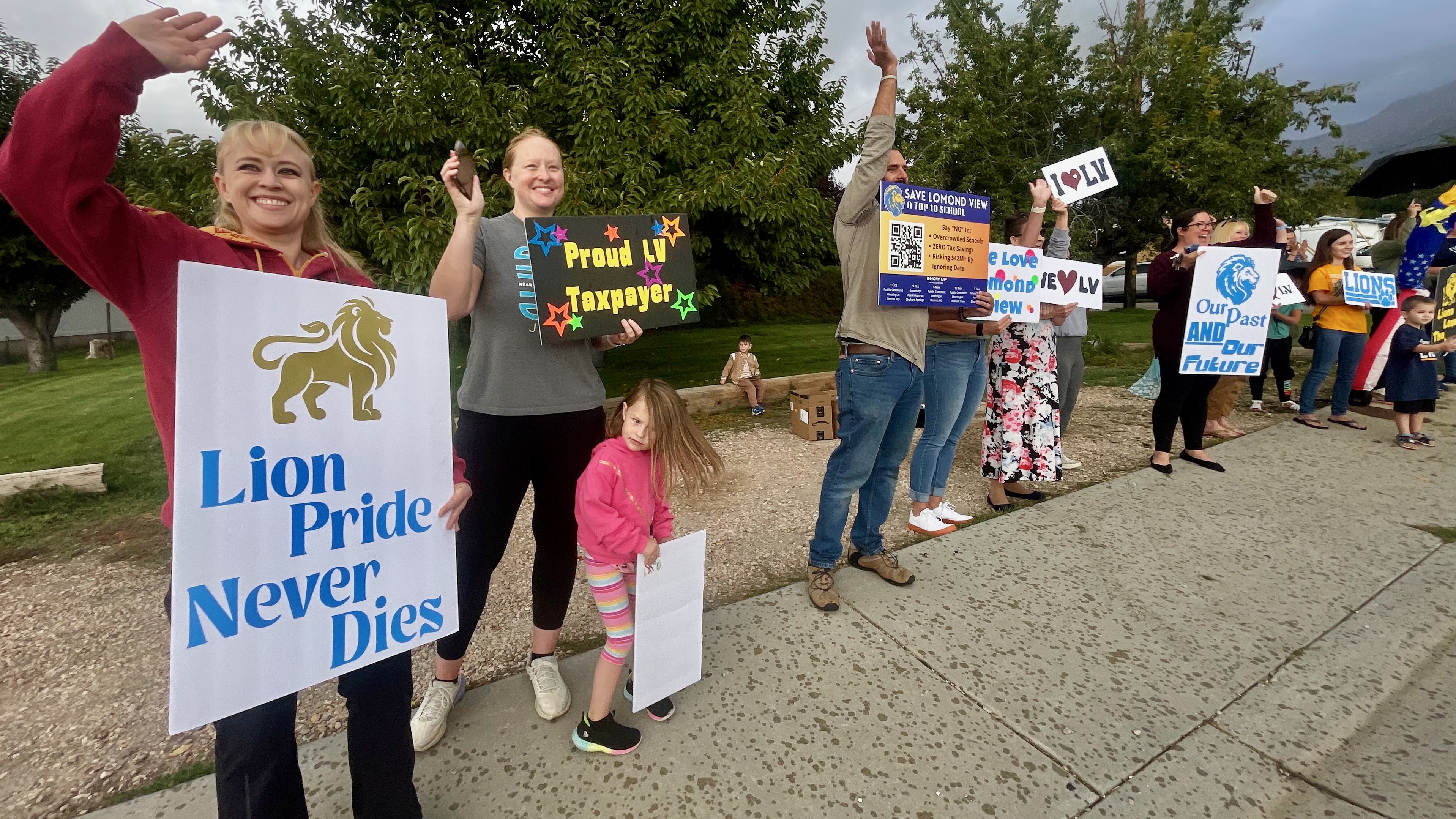 Boosters of Lomond View Elementary in Pleasant View demonstrated on Monday outside the school against talk of shuttering the facility.