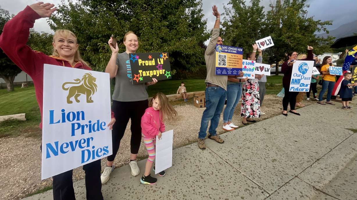 Boosters of Lomond View Elementary in Pleasant View demonstrated on Monday outside the school against talk of shuttering the facility.