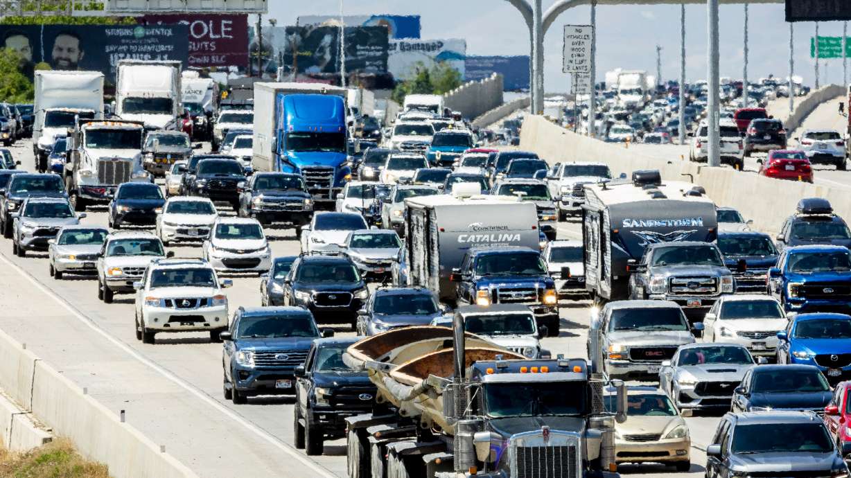 Cars slowly move through traffic on southbound I-15 in Lehi on May 23. Hosting a second Winter Games in 2034 is "an Olympic-sized opportunity" for the state, according to a new report by the University of Utah's Kem C. Gardner Policy Institute.