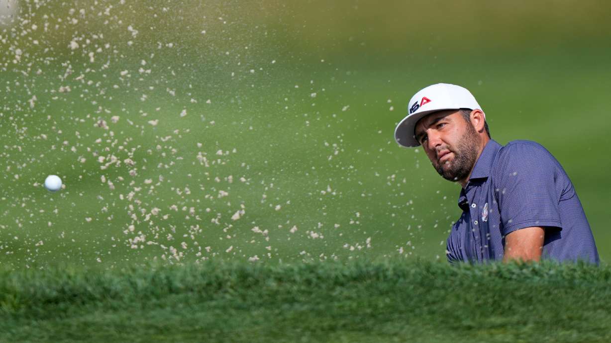 United States' Scottie Scheffler hits from the bunker on the 11th hole during a practice round for the Ryder Cup golf tournament, Tuesday, Sept. 23, 2025, in Farmingdale, N.Y., at Bethpage State Park's Black Course.