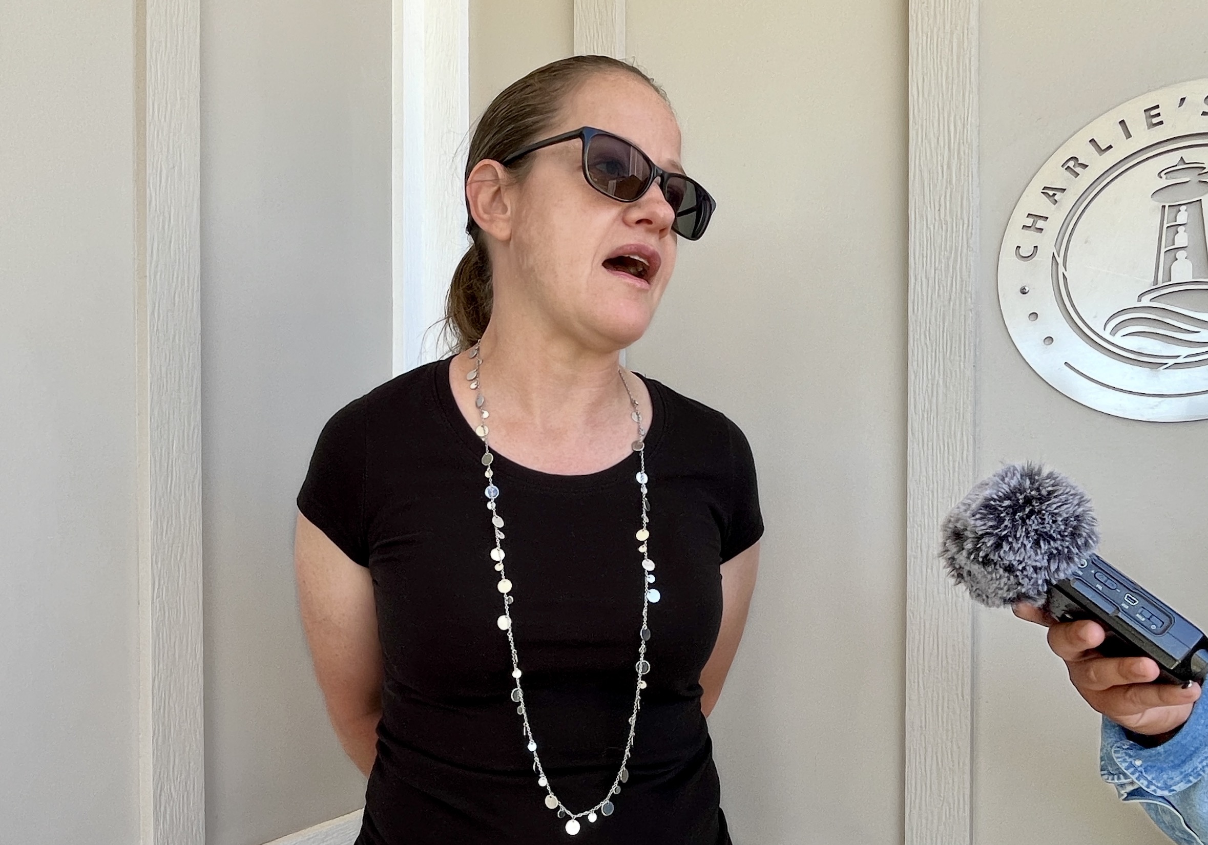 Melissa Hepworth, a resident of the Other Side Village in Salt Lake City, shares her story with KSL.com on Tuesday at a press conference celebrating the village's planned Phase 2 expansion.