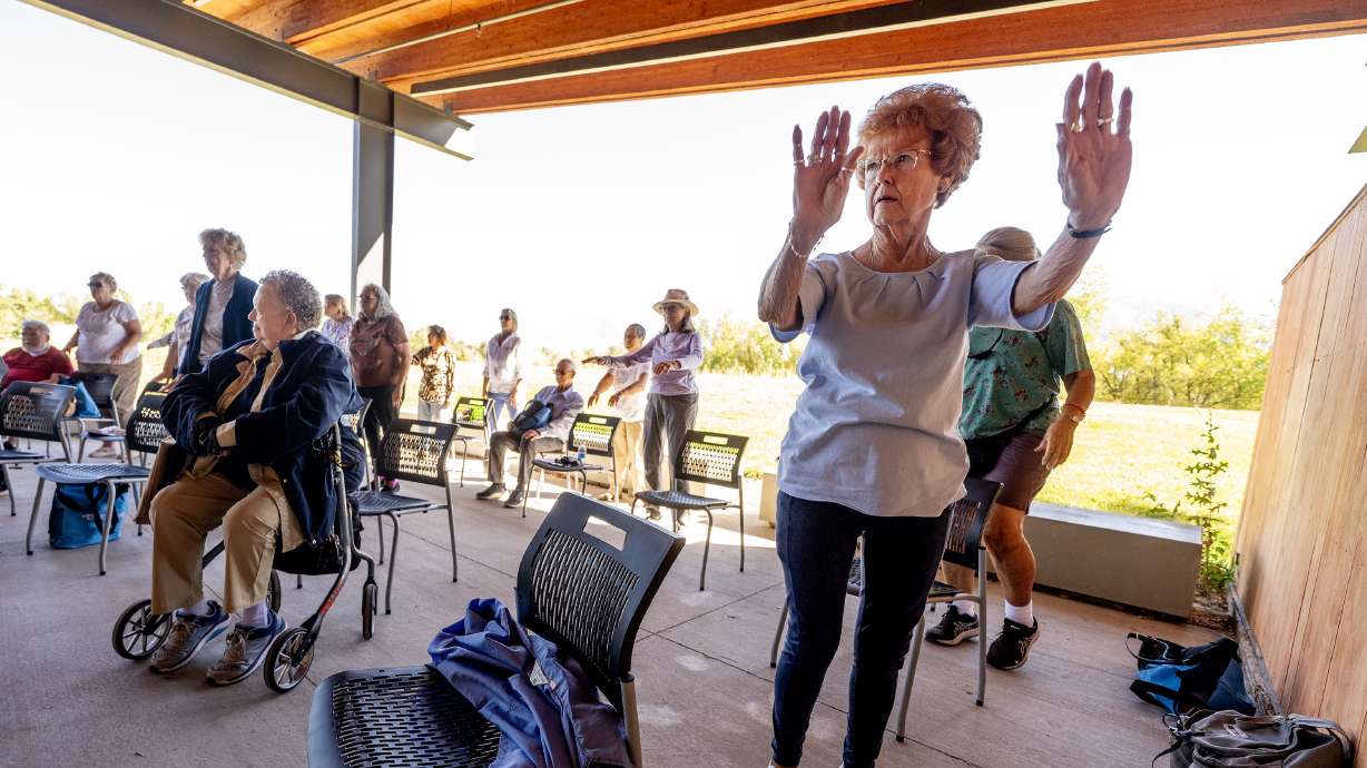 Bess Anderson and others exercise at the Wheeler Farm Outdoor Education Center in Murray on Tuesday. It was part of an event to raise awareness about physical health and preventing falls.