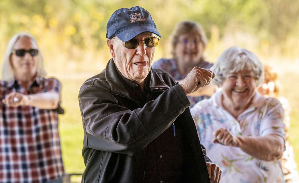 John Thalman and others do exercises as Salt Lake County Falls Prevention Coalition hosts Strong and Steady, a free community event highlighting ways to prevent falls, which are the leading cause of injury among older adults, at the Wheeler Farm Outdoor Education Center in Murray on Tuesday.