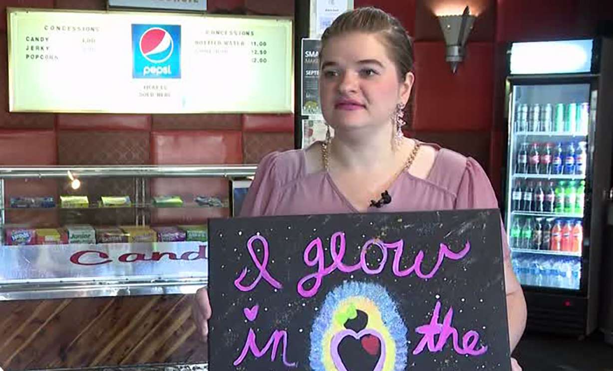Melanie Arbizu says the Rape Recovery Center in Tooele has played a huge role in her healing so far. Her art piece has a galaxy-inspired background with hot pink writing that says, "I glow in the dark."