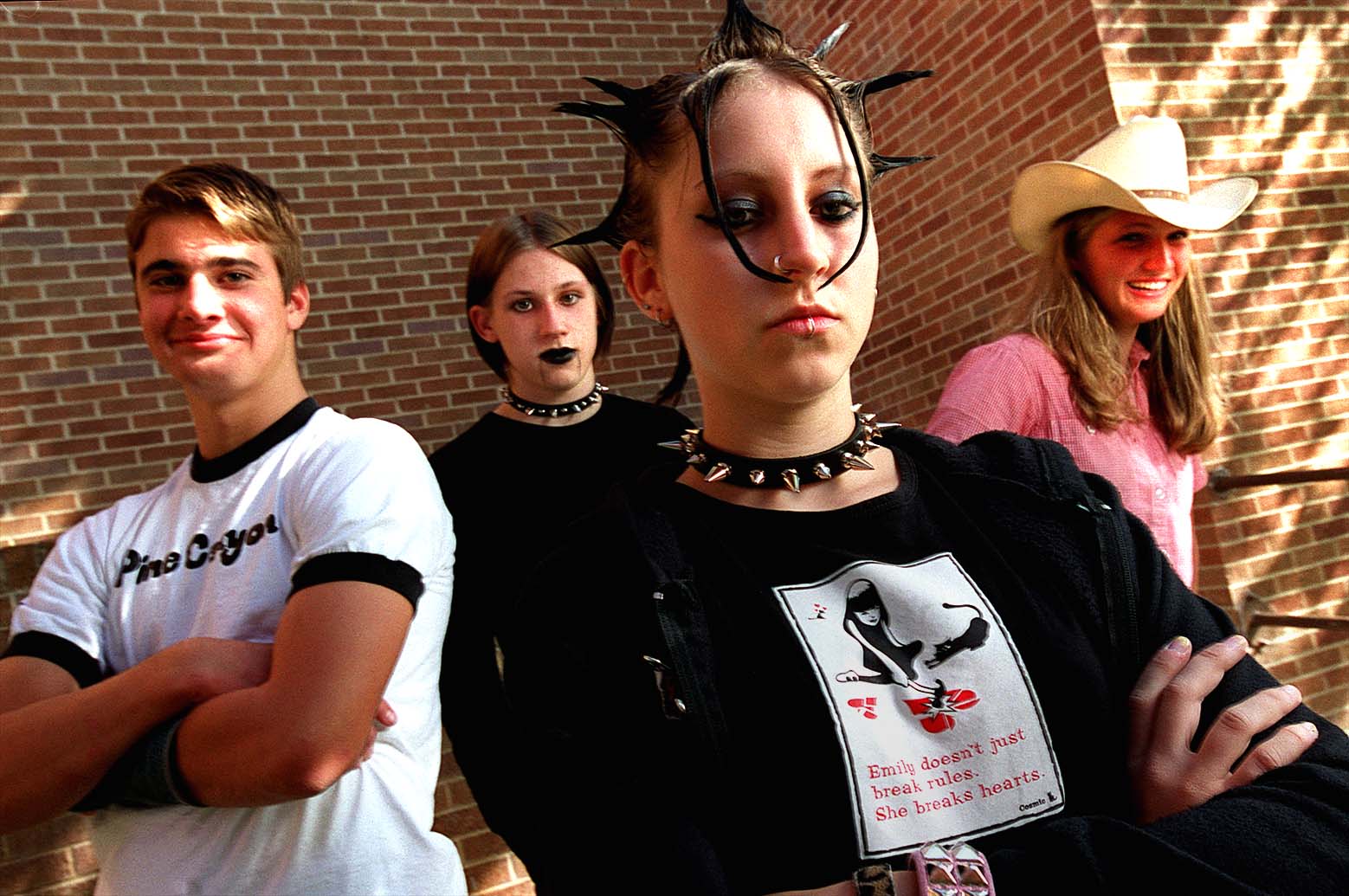 Garrett Halligan, David Petersen, Rashelle McGregor and Jackie Jensen pose for a photo Oct. 18, 2000, styling their outfits after their favorite music at the time.
