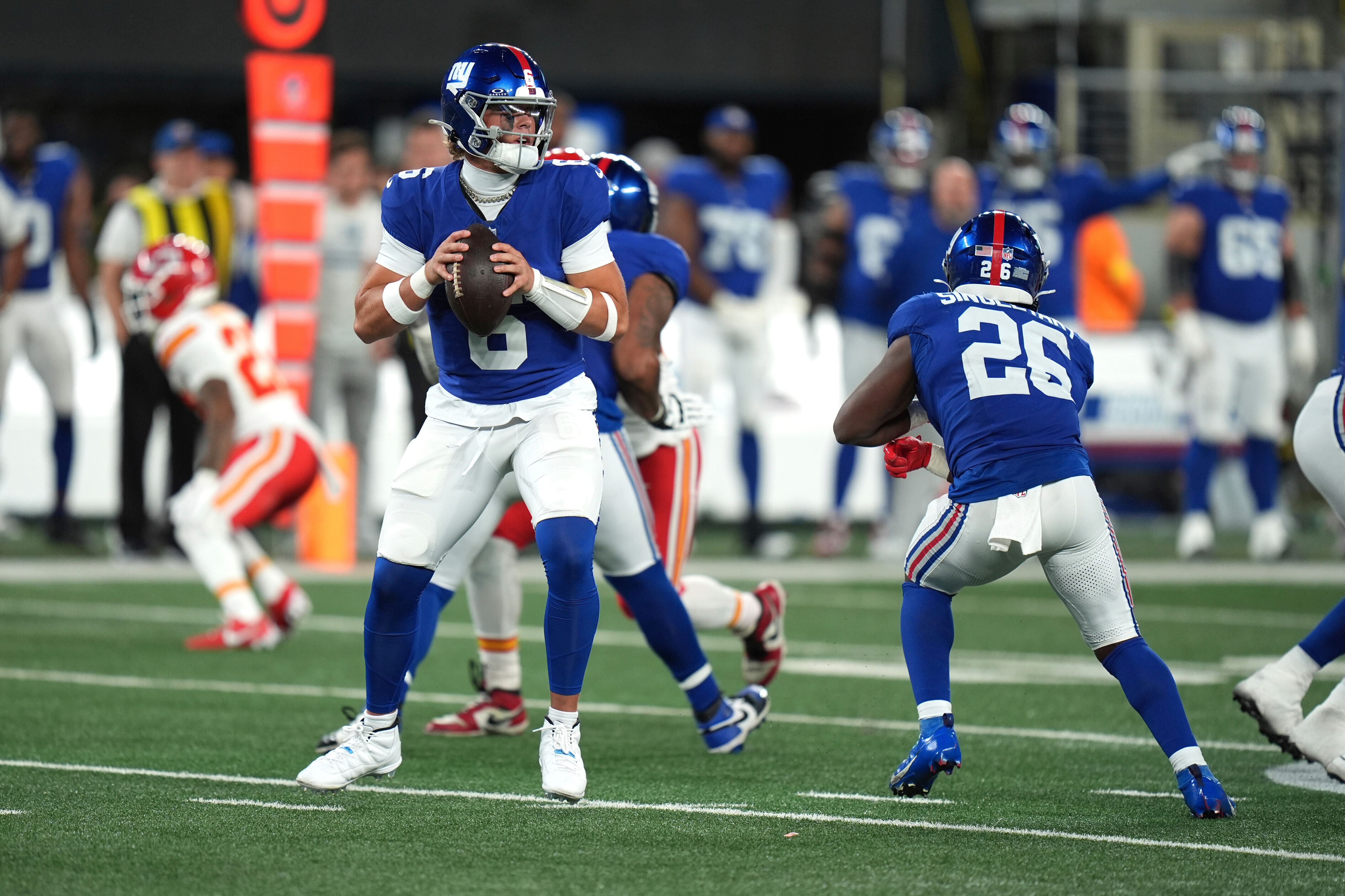 FILE - New York Giants quarterback Jaxson Dart drops back to pass during the second half of an NFL football game against the Kansas City Chiefs Sunday, Sept. 21, 2025, in East Rutherford, N.J. 