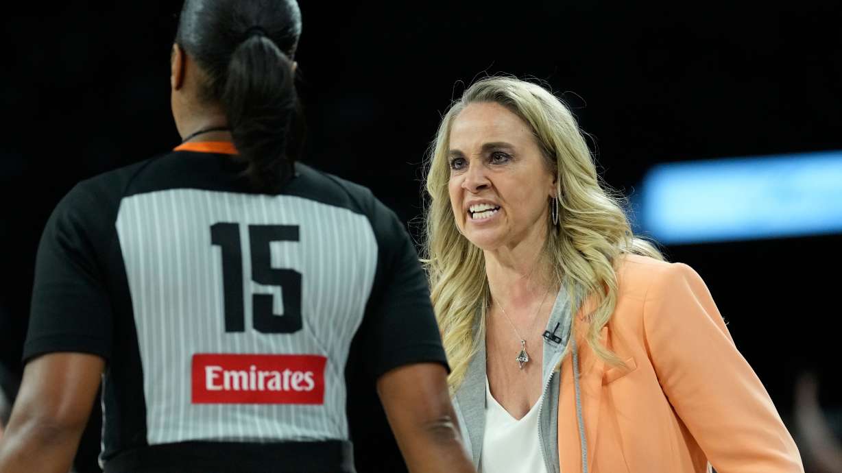 Las Vegas Aces head coach Becky Hammon speaks with an official during the second half of Game 2 of a WNBA basketball playoff semifinals series against the Indiana Fever, Tuesday, Sept. 23, 2025, in Las Vegas.