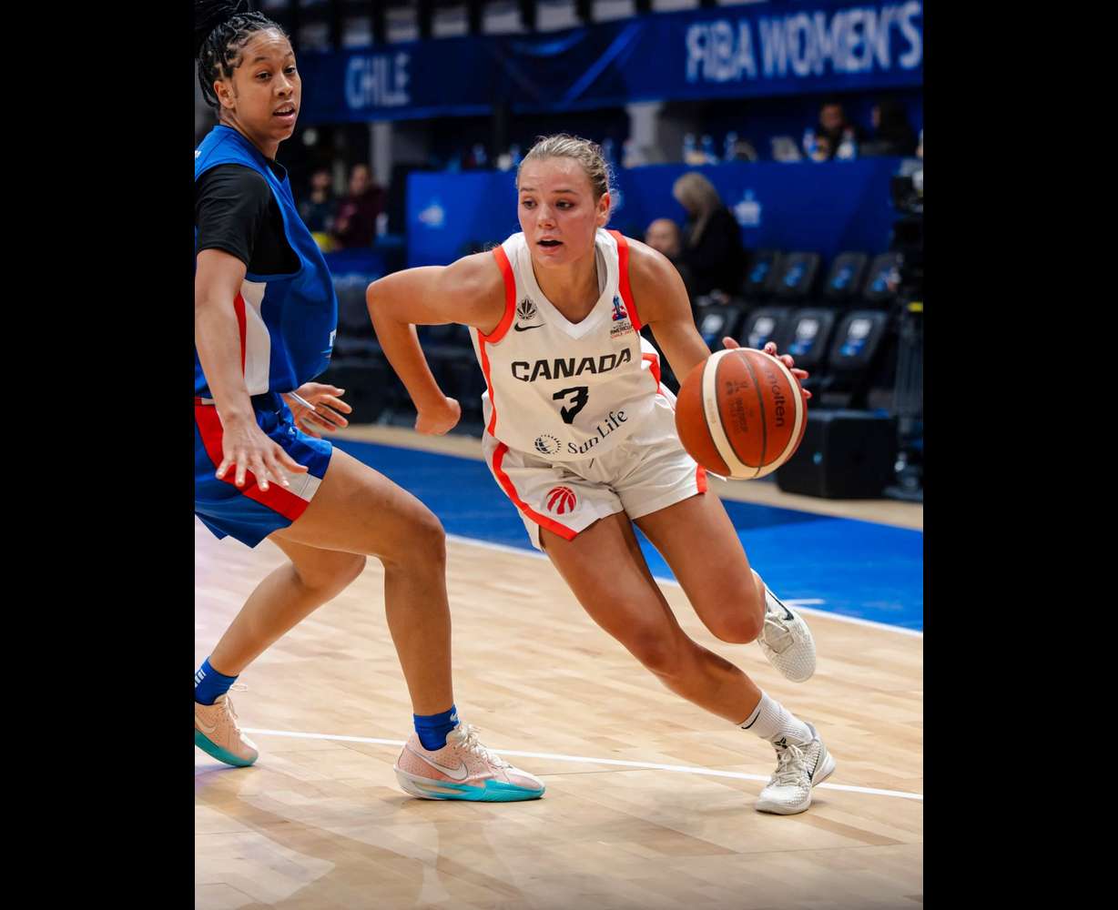 Delaney Gibb dribbles around defender at 2025 FIBA AmeriCup