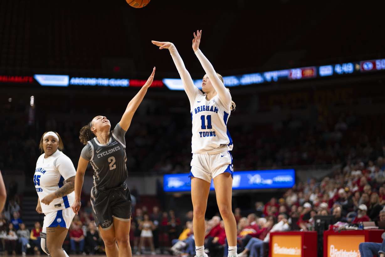 Delaney Gibb shoots a jumper over an Iowa State defender.