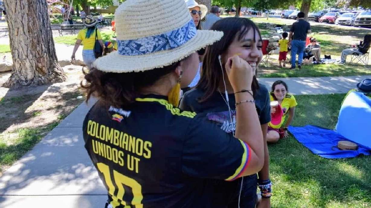 Reps from the Colombian and Ecuadorian communities seek consular offices in Utah. The photo shows a child getting face paint at an undated event hosted by Colombianos Unidos Utah, sponsoring the petition for a Colombian consular office.
