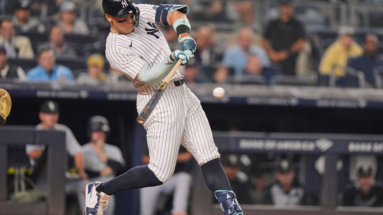 New York Yankees' Aaron Judge hits a three-run home run during the second inning of a baseball game against the Chicago White Sox Wednesday, Sept. 24, 2025, in New York.