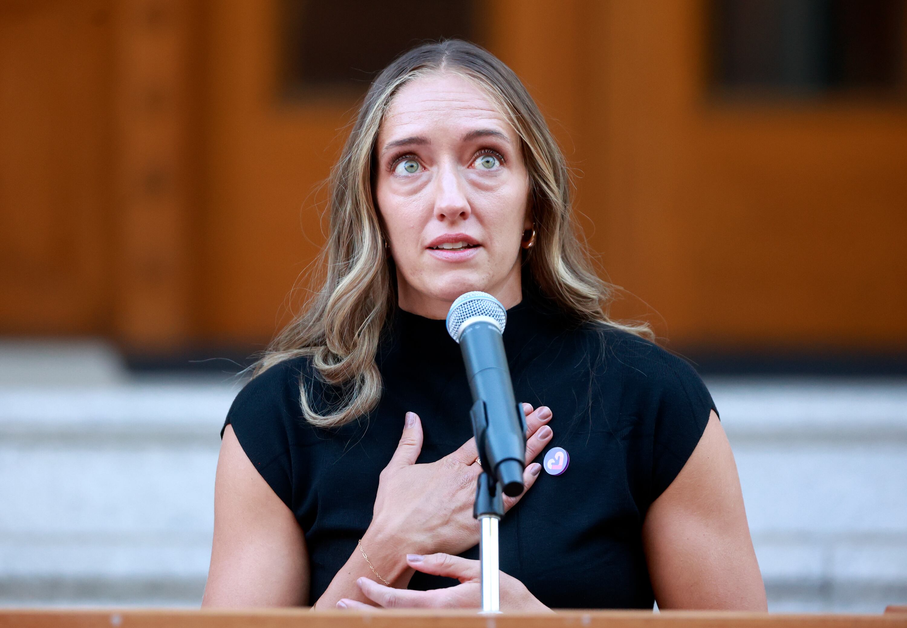 Janelle McGinty, care team leader with Utah Foster Care, speaks during the launch of Care Communities at the Governor’s Mansion in Salt Lake City on Wednesday. McGinty is one of the over 300 volunteers that signed up for the pilot program.