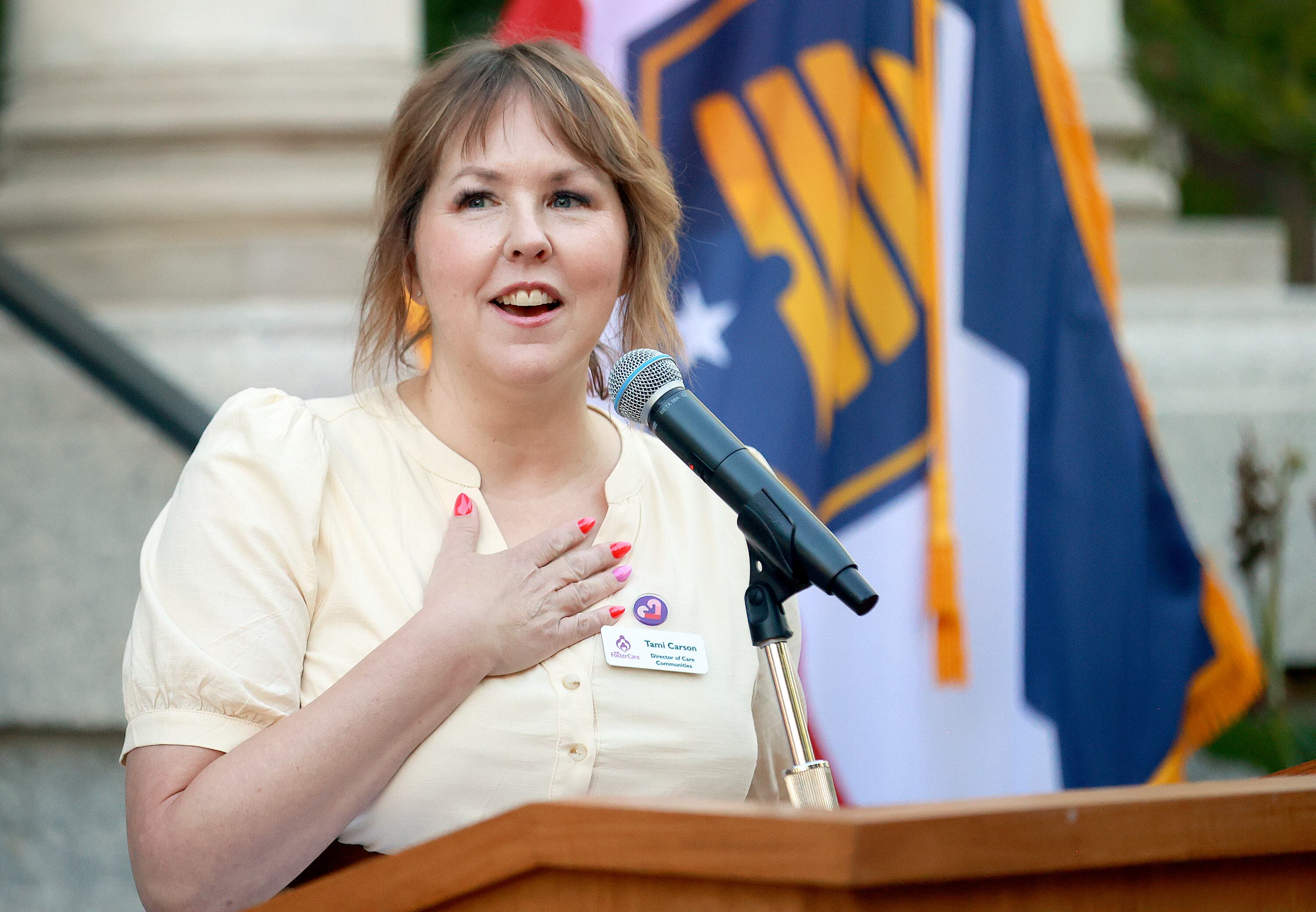 Tami Carson, Care Communities director at Utah Foster Care, speaks during the launch of Care Communities at the Governor’s Mansion in Salt Lake City on Wednesday. Care Communities has had a huge impact on Utah, even before its launch.