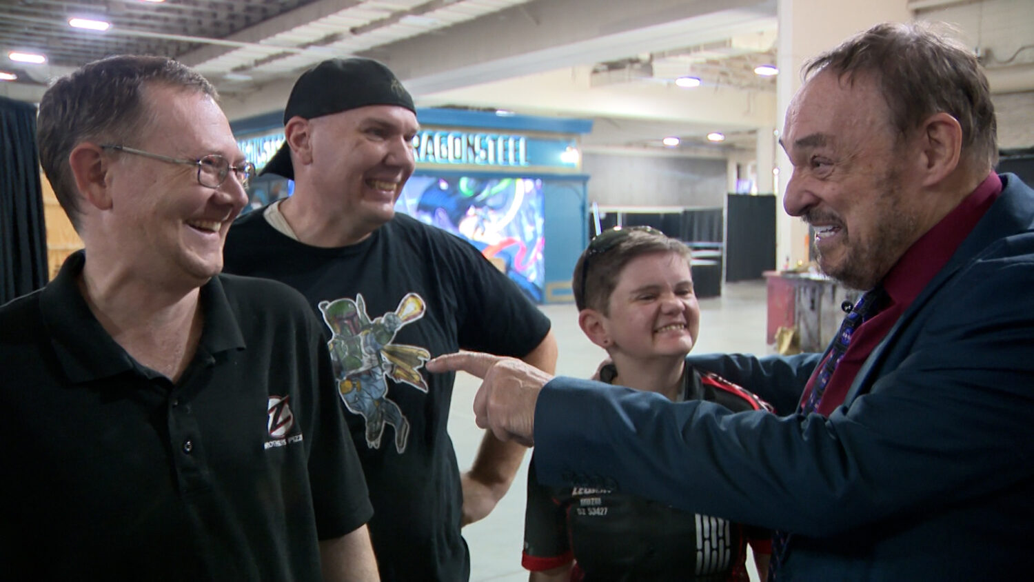 John Rhys-Davies from "Indiana Jones” and "The Lord of the Rings" talks with fans at FanX in Salt Lake City, Wednesday. Organizers are doubling security efforts at this year's event as a precaution.