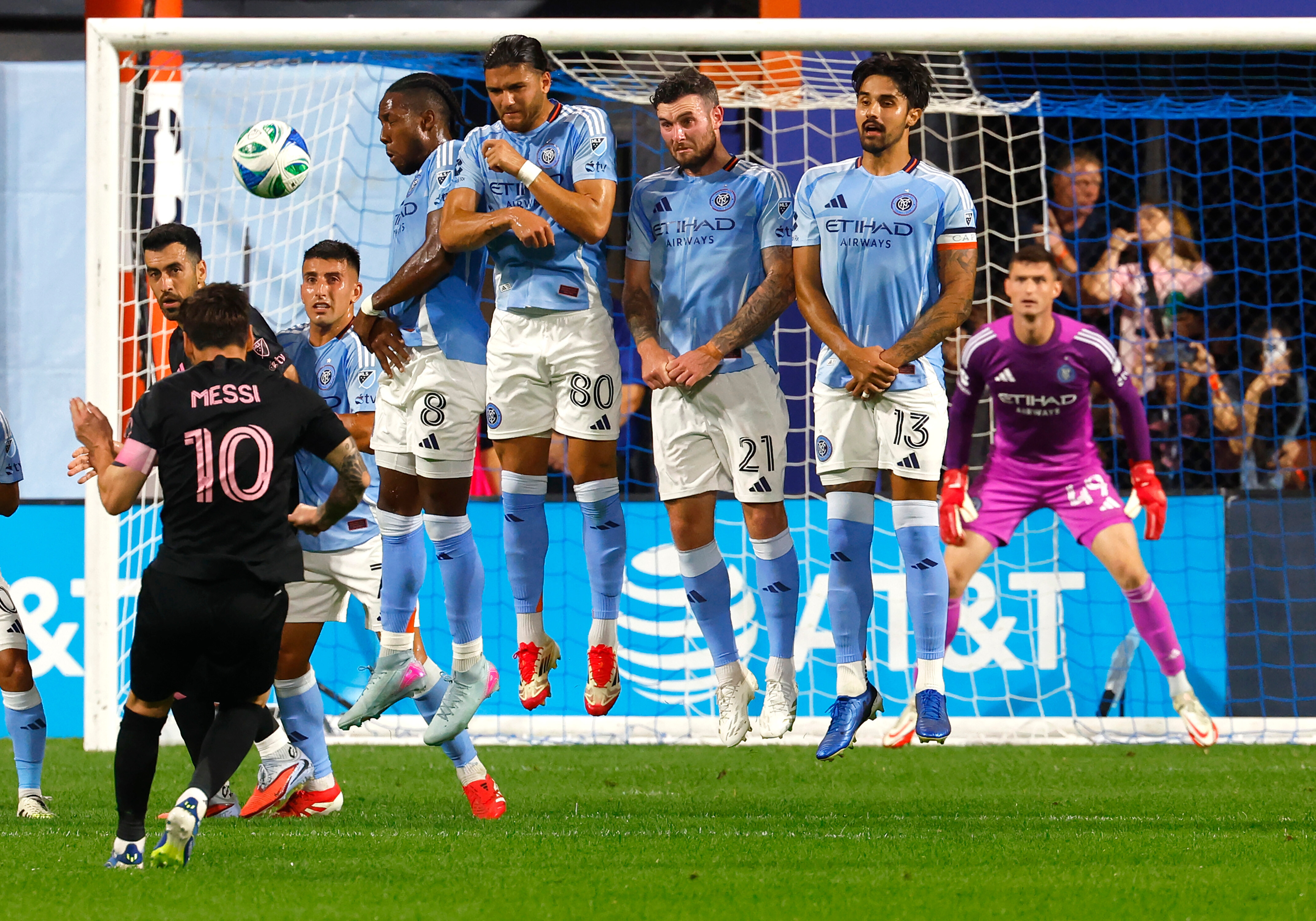 New York City FC defend a direct kick by Inter Miami forward Lionel Messi (10) during the first half of a MLS soccer game, Wednesday, Sept. 24, 2025, in New York. 