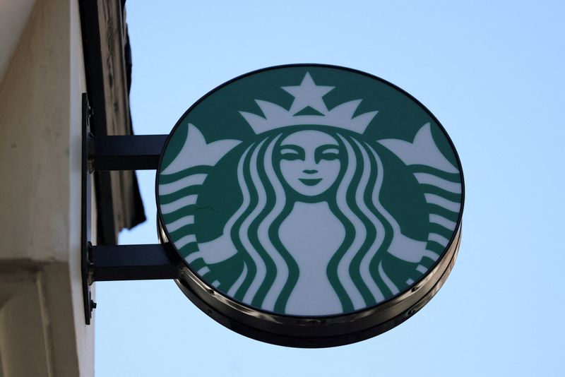 Starbucks said on Thursday it would close underperforming coffee shops, mainly in North America, and cut about 900 jobs as part of a restructuring plan.