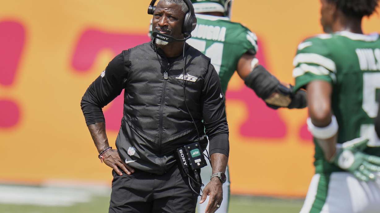 New York Jets head coach Aaron Glenn watches from the sidelines during the first half of an NFL football game against the Tampa Bay Buccaneers Sunday, Sept. 21, 2025, in Tampa, Fla.