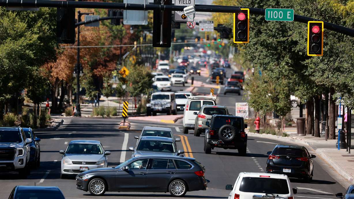 Traffic moves along and across 2100 South in the Sugar House neighborhood of Salt Lake City on Thursday. Sugar House businesses are celebrating the end of construction in the area with Sugar Fest on Oct. 4.