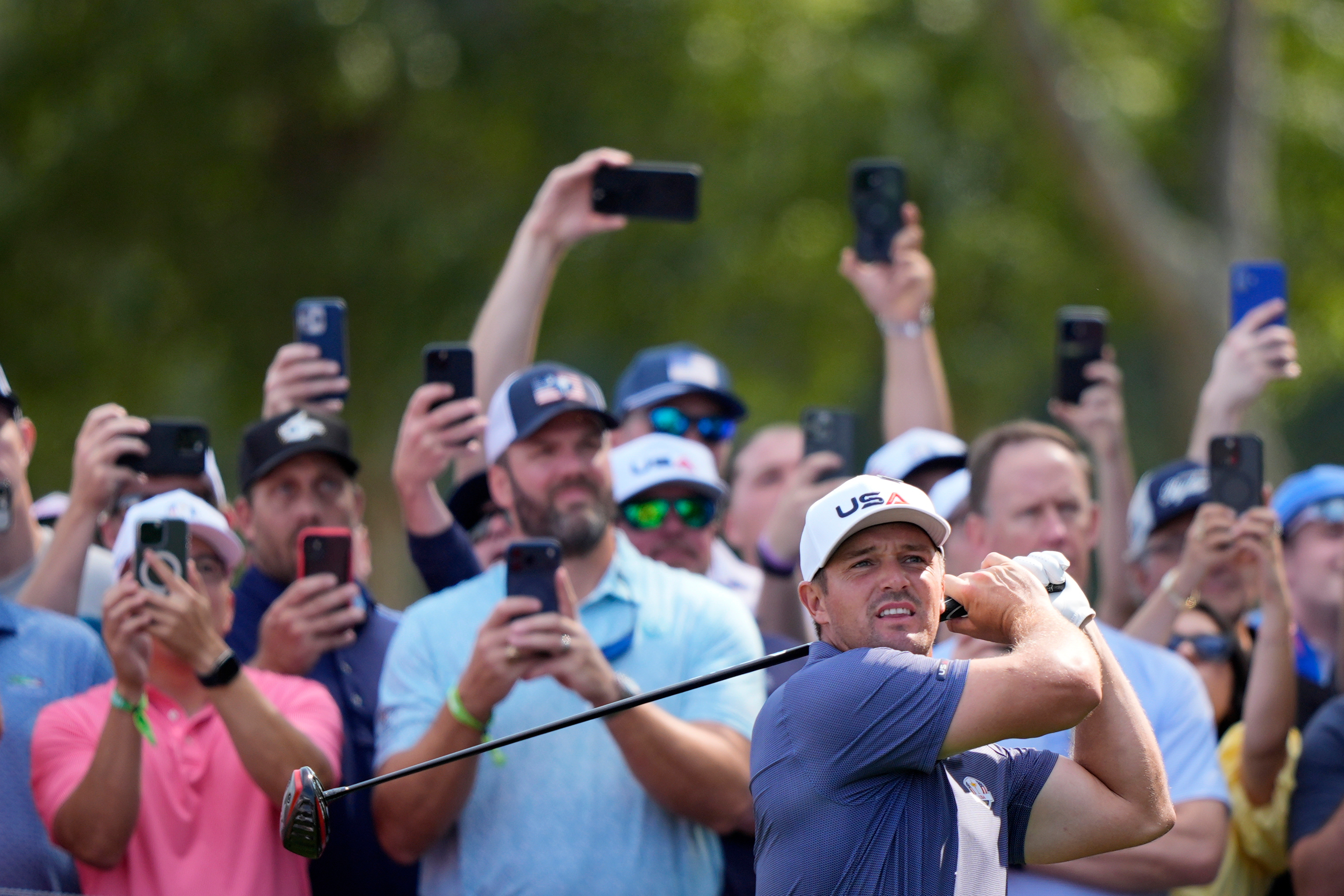 United States' Bryson DeChambeau watches his tee shot on the 12th hole during a practice round for the Ryder Cup golf tournament, Tuesday, Sept. 23, 2025, in Farmingdale, N.Y., at Bethpage State Park's Black Course. 