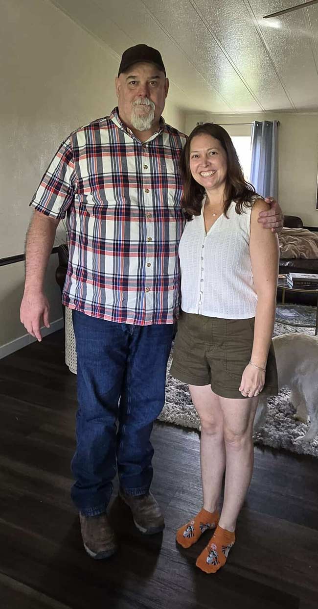 Kevin Thompson with his half-sister, Courtney Griffith, in Twin Falls, Idaho, Friday. Griffith accompanied her father, Paul, on the trip to meet Thompson, along with several other family members.