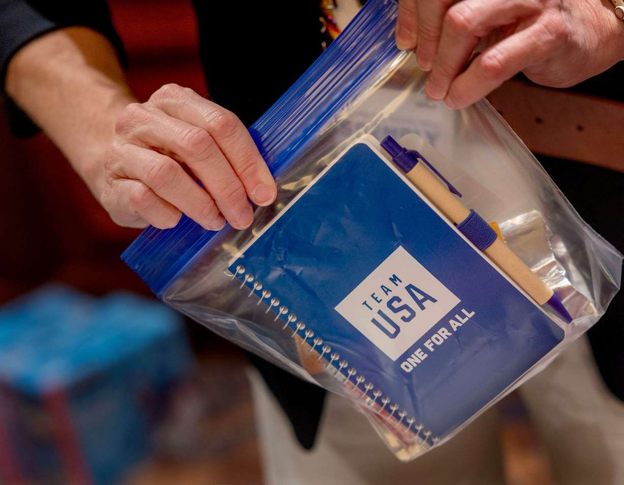 Snack kits are assembled during Utah first lady Abby Cox’s Show Up initiative at Little America in Salt Lake City on Thursday. Cox said the kits are ways to connect with and support Utah's "youngest citizens."
