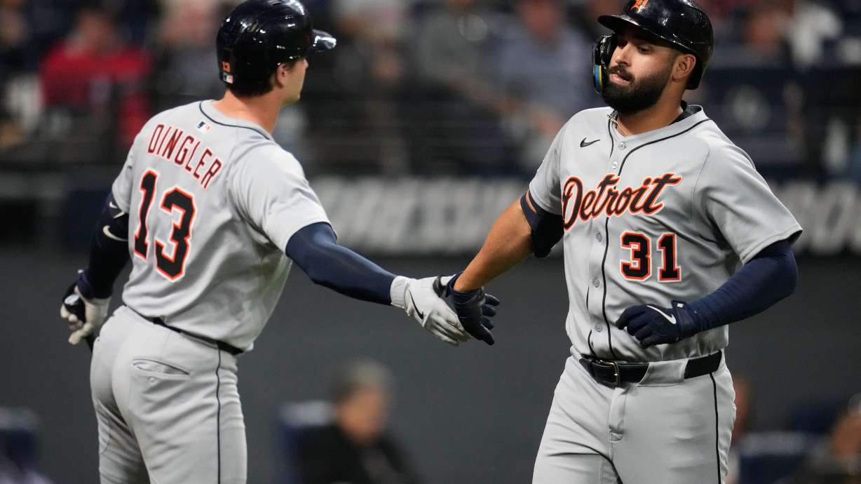 Detroit Tigers' Riley Greene (31) is congratulated by Dillon Dingler (13) after hitting a home run in the fourth inning of a baseball game against the Cleveland Guardians in Cleveland, Thursday, Sept. 25, 2025.