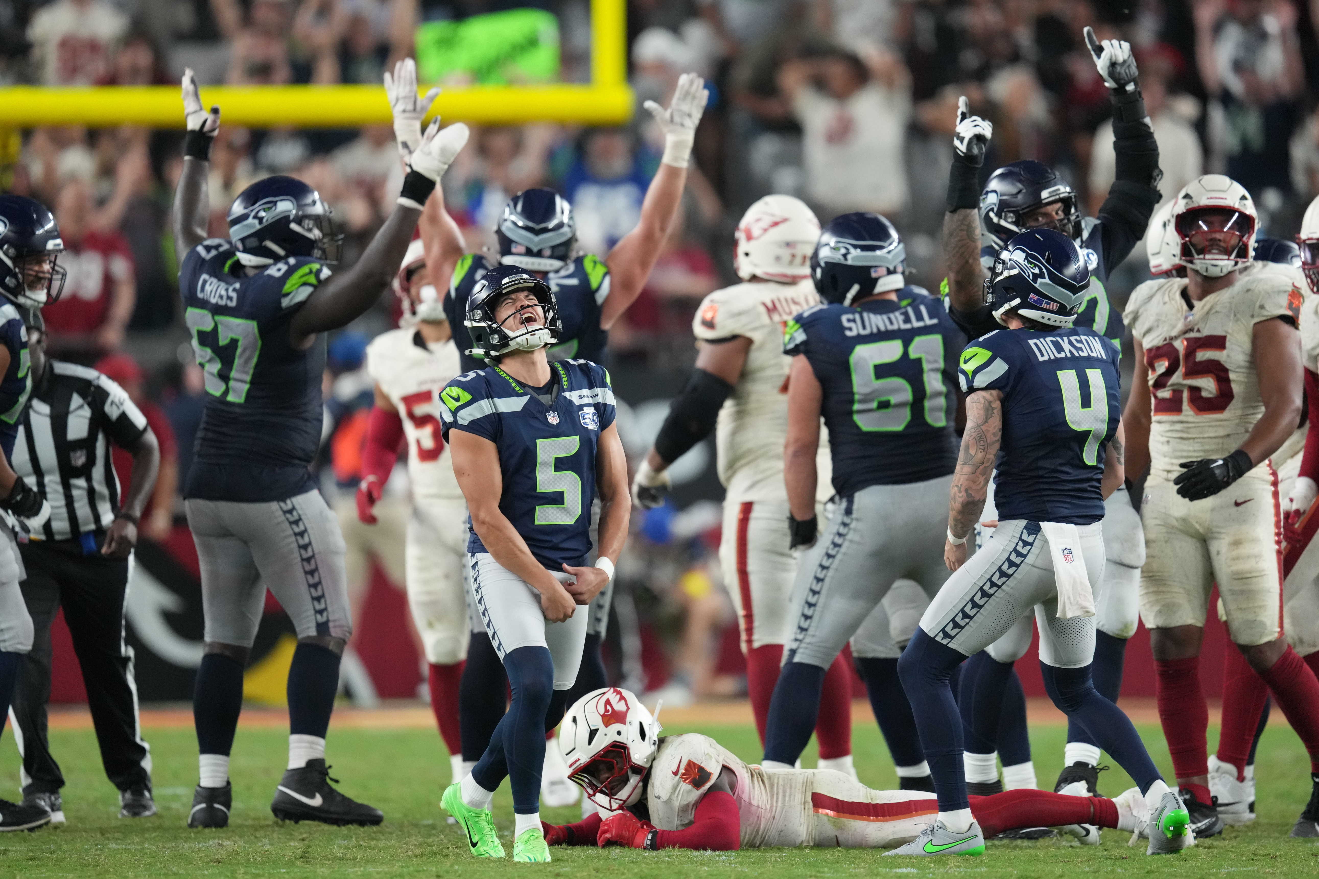 Seattle Seahawks kicker Jason Myers (5) celebrates after making a 52-yard field goal as time expires during the second half of an NFL football game Thursday, Sept. 25, 2025, in Glendale, Ariz.