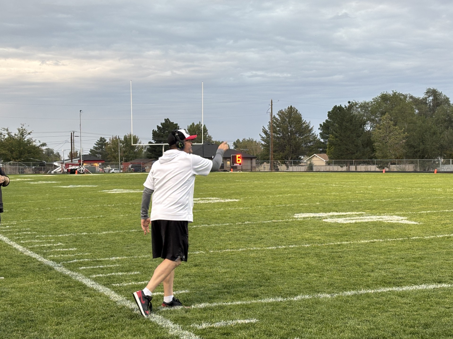 Alan Mouritsen coaching his team during a game.