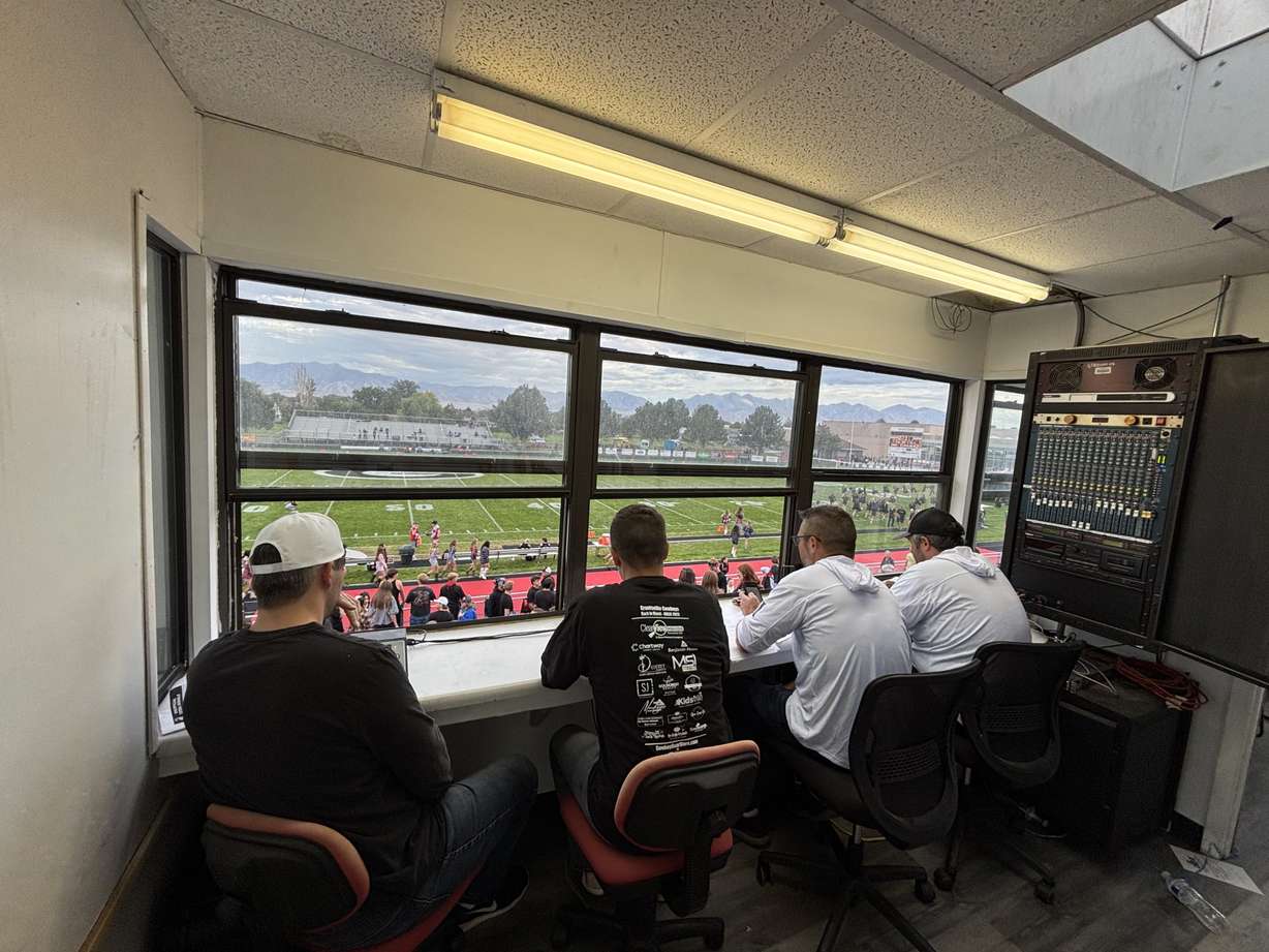Brent, Carl, Rich, and Kevin getting ready for Grantsville's football game versus Ben Lomond.