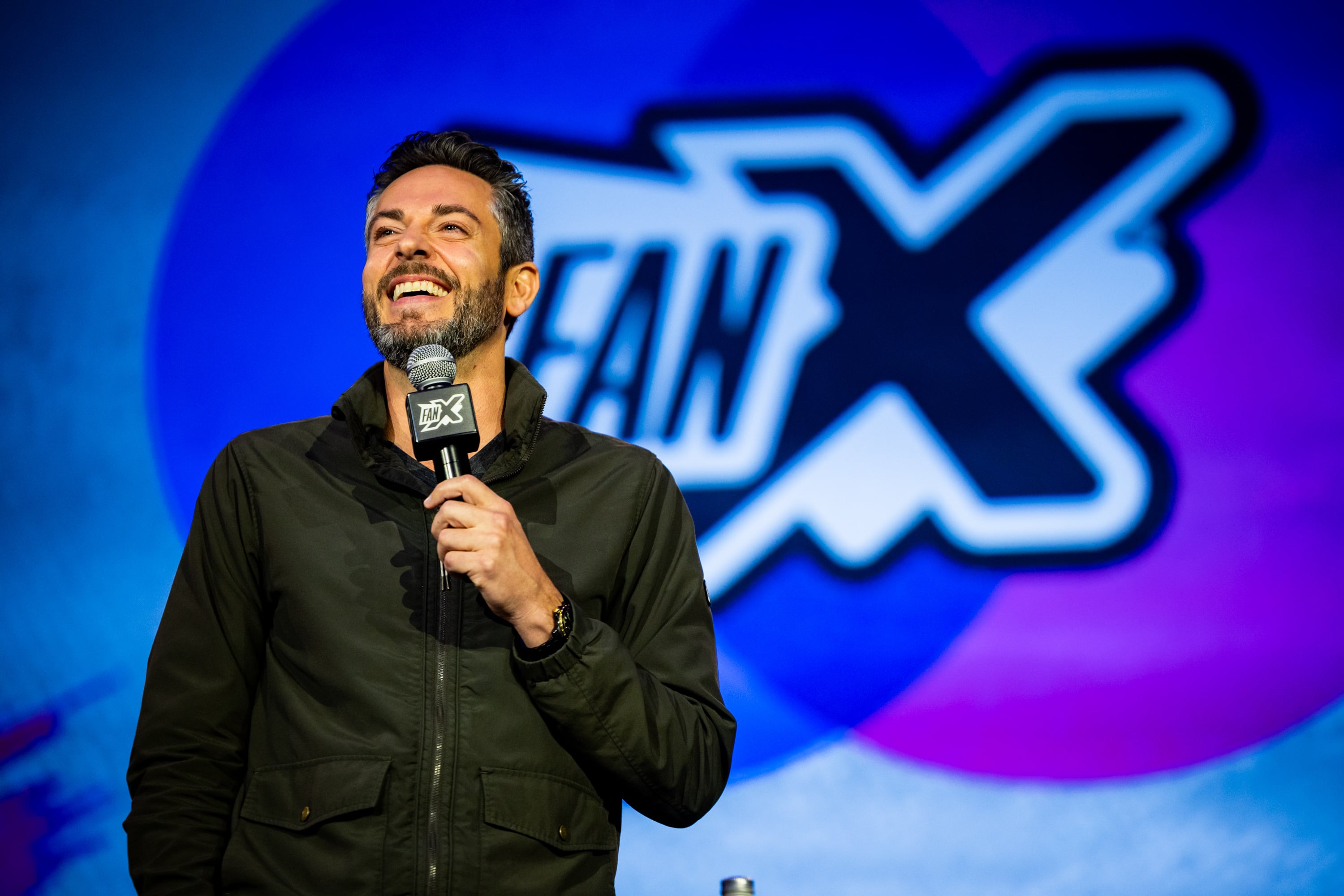 Actor Zachary Levi speaks at FanX at the Salt Palace Convention Center on Thursday. Levi made an impassioned plea to "love each other" during his panel discussion, along with openly sharing some of his life experiences.