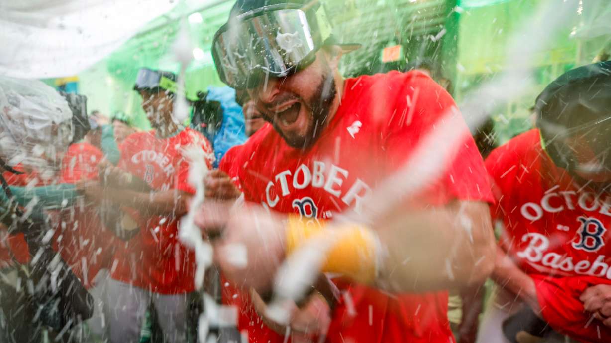 Boston Red Sox outfielder Wilyer Abreu celebrates with teammates after defeating the Detroit Tigers in a baseball game to advance to the post season, Friday, Sept. 26, 2025, in Boston.