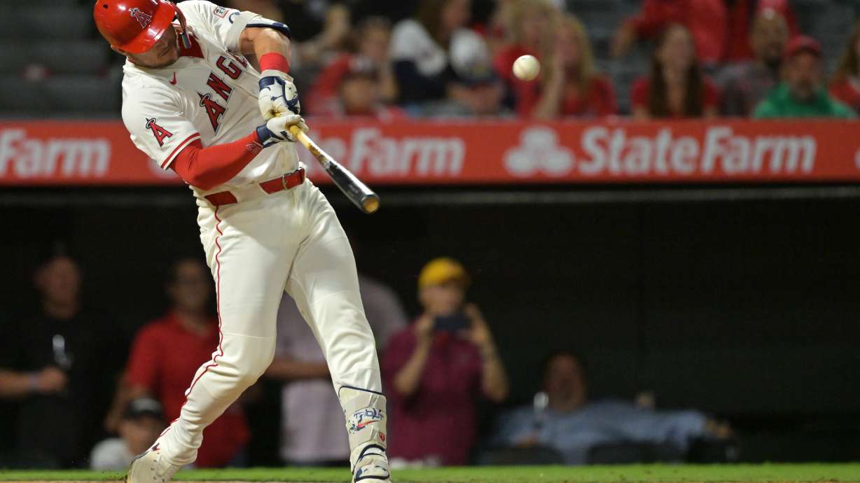 Los Angeles Angels' Mike Trout hits a solo home run during the eighth inning of a baseball game against the Houston Astros, Friday, Sept. 26, 2025, in Anaheim, Calif.