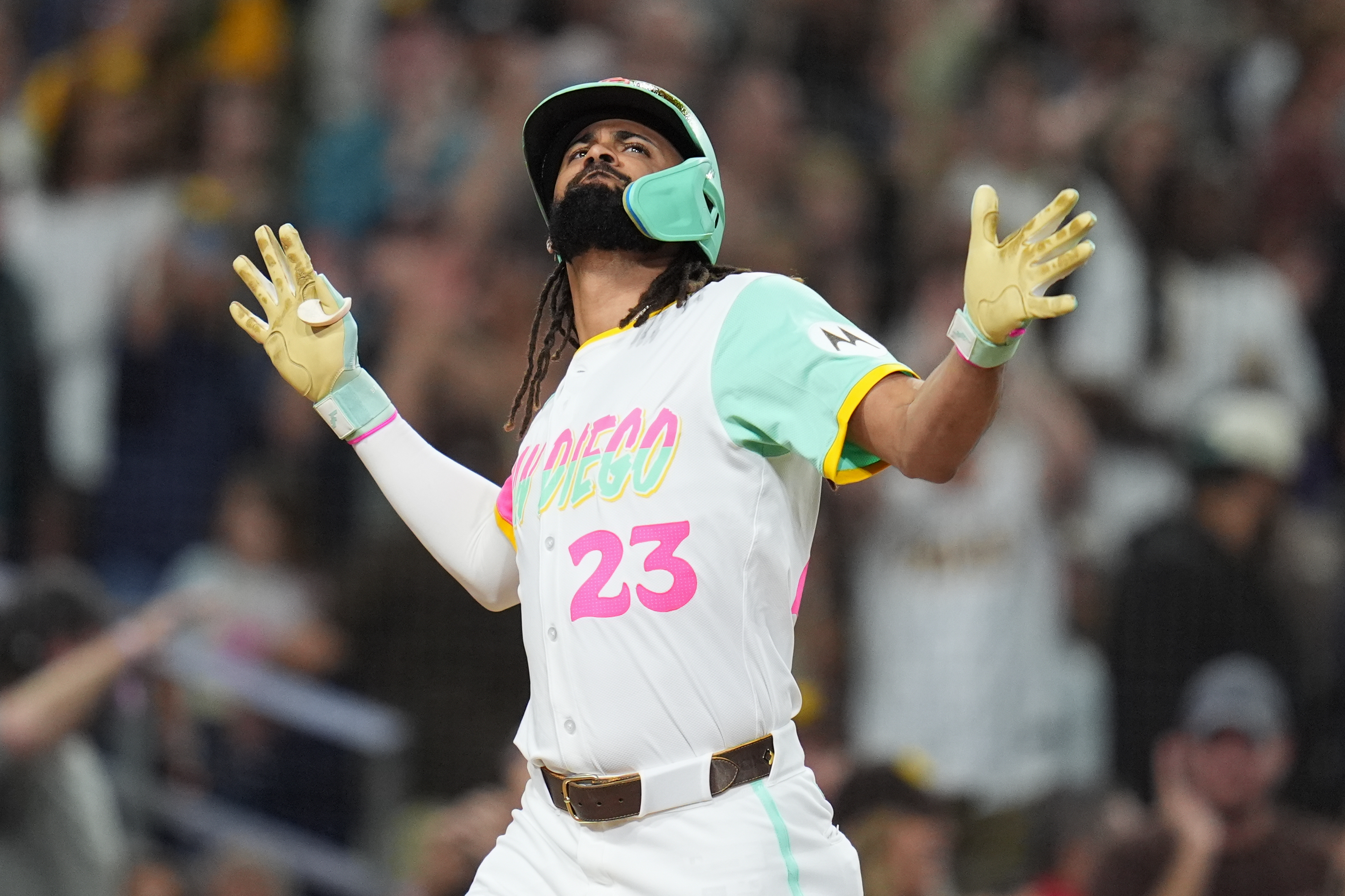 San Diego Padres' Fernando Tatis Jr. celebrates after hitting a grand slam during the fourth inning of a baseball game against the Arizona Diamondbacks Friday, Sept. 26, 2025, in San Diego. 