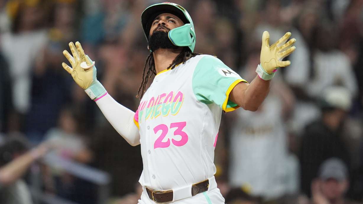 San Diego Padres' Fernando Tatis Jr. celebrates after hitting a grand slam during the fourth inning of a baseball game against the Arizona Diamondbacks Friday, Sept. 26, 2025, in San Diego.