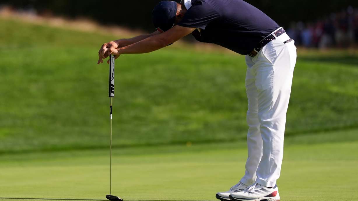 United States' Collin Morikawa reacts after missing a putt on the 13th hole at Bethpage Black golf course during the Ryder Cup golf tournament, Saturday, Sept. 27, 2025, in Farmingdale, N.Y.