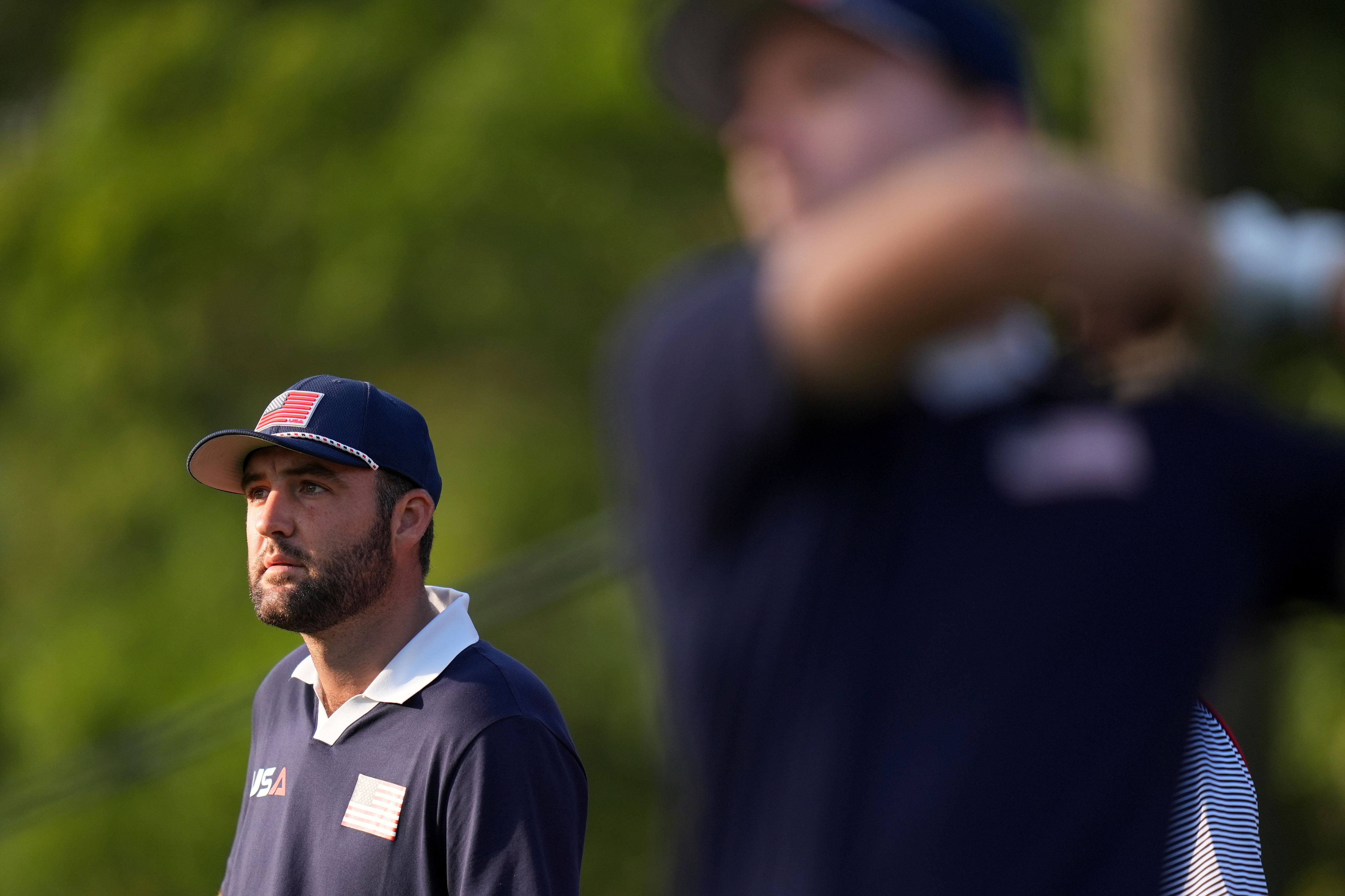 United States' Scottie Scheffler watches on the second hole at Bethpage Black golf course during the Ryder Cup golf tournament, Saturday, Sept. 27, 2025, in Farmingdale, N.Y.