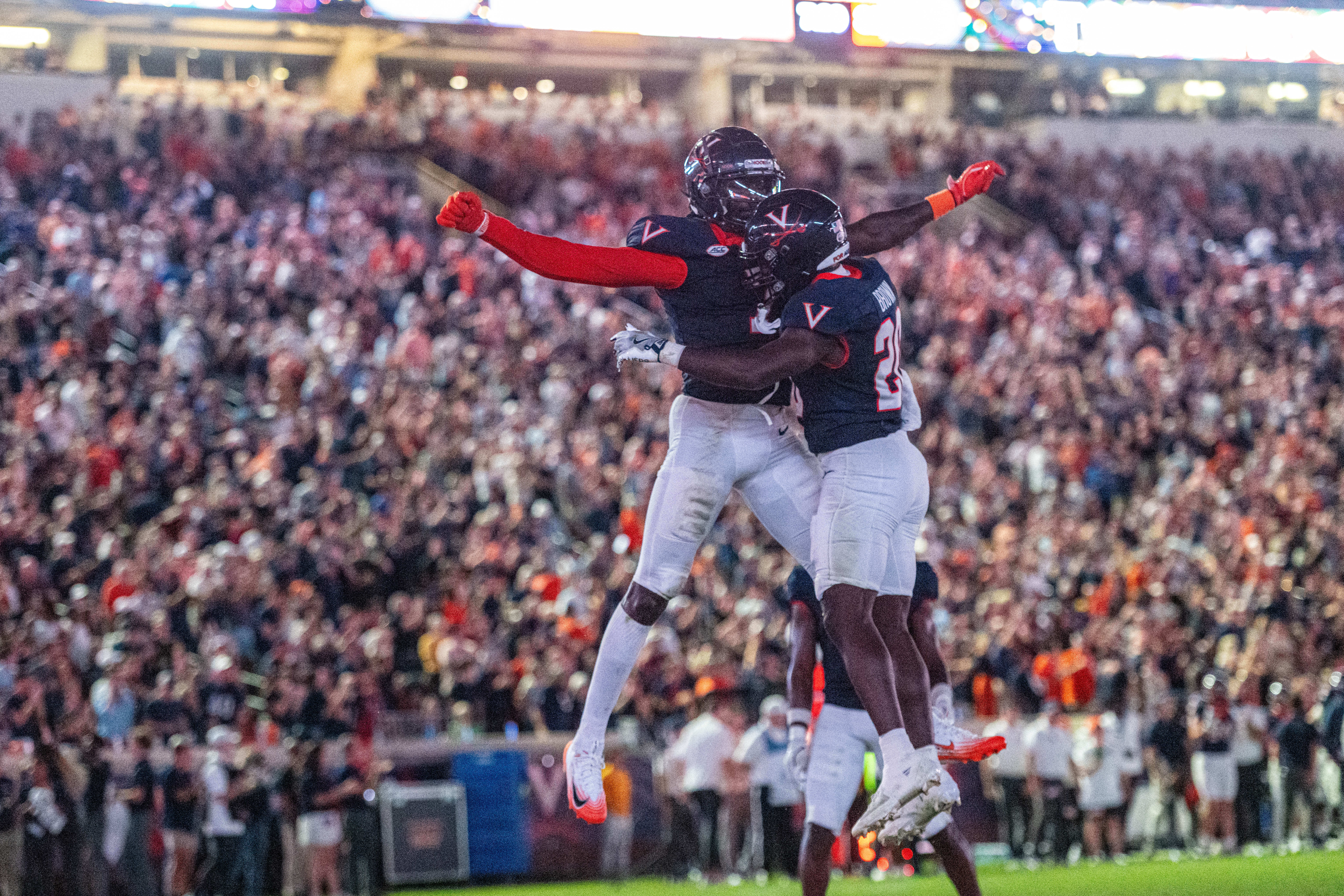 Virginia running back Xavier Brown (20) Virginia wide receiver Andre Greene Jr. (2) celebrate after a touchdown during the second half of an NCAA college football game, Friday, Sept. 26 2025, in Charlottesville, Va. 