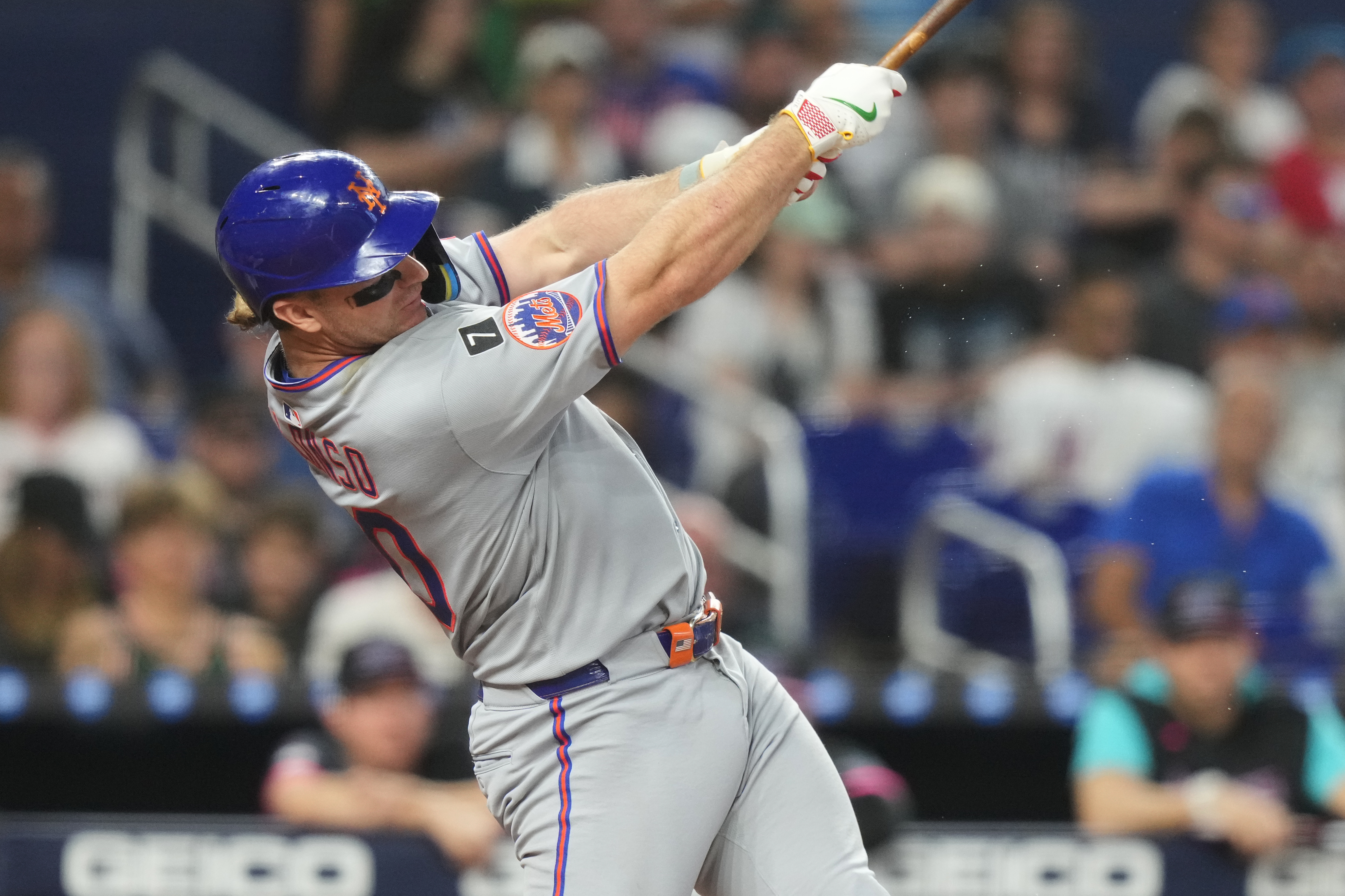 New York Mets' Pete Alonso hits a solo home run during the third inning of a baseball game against the Miami Marlins, Saturday, Sept. 27, 2025, in Miami. 