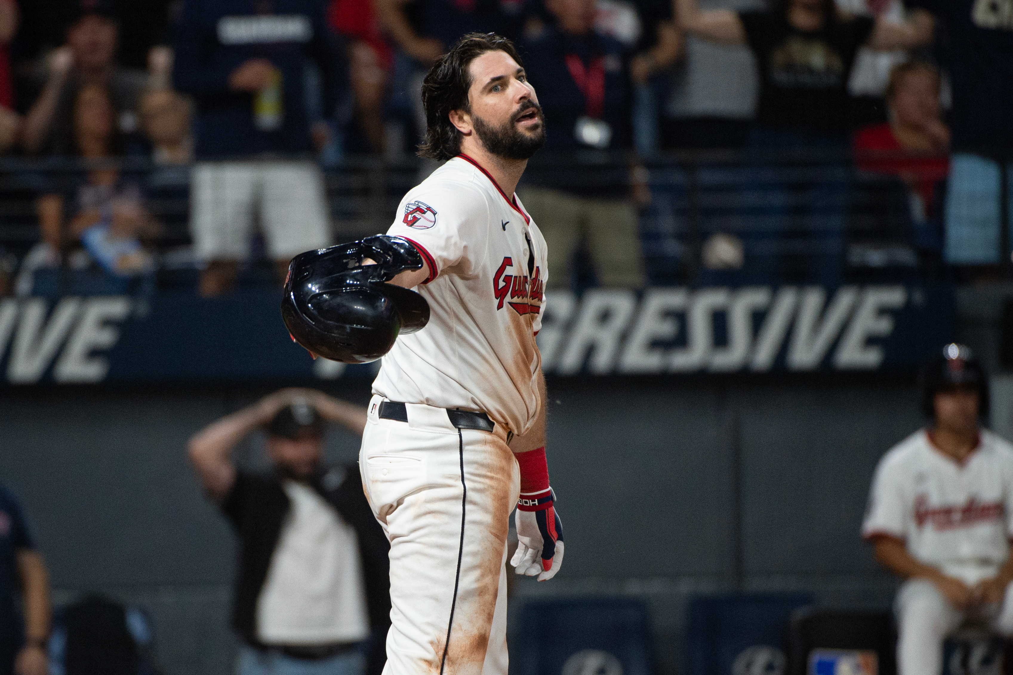 Cleveland Guardians' Austin Hedges reacts after being called out on strikes from Texas Rangers starting pitcher Jacob Latz to end the fifth inning of a baseball game, Saturday, Sept. 27, 2025, in Cleveland. 