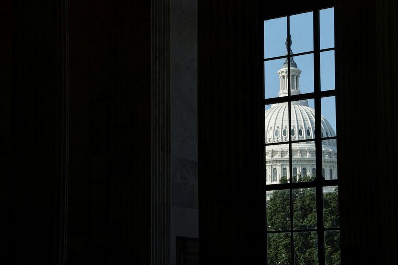 A general view of the Capitol dome in Washington, D.C., July 8. Three days before a shutdown, a spending watchdog warns that $8B for health care and education could go unused under Trump’s administration.