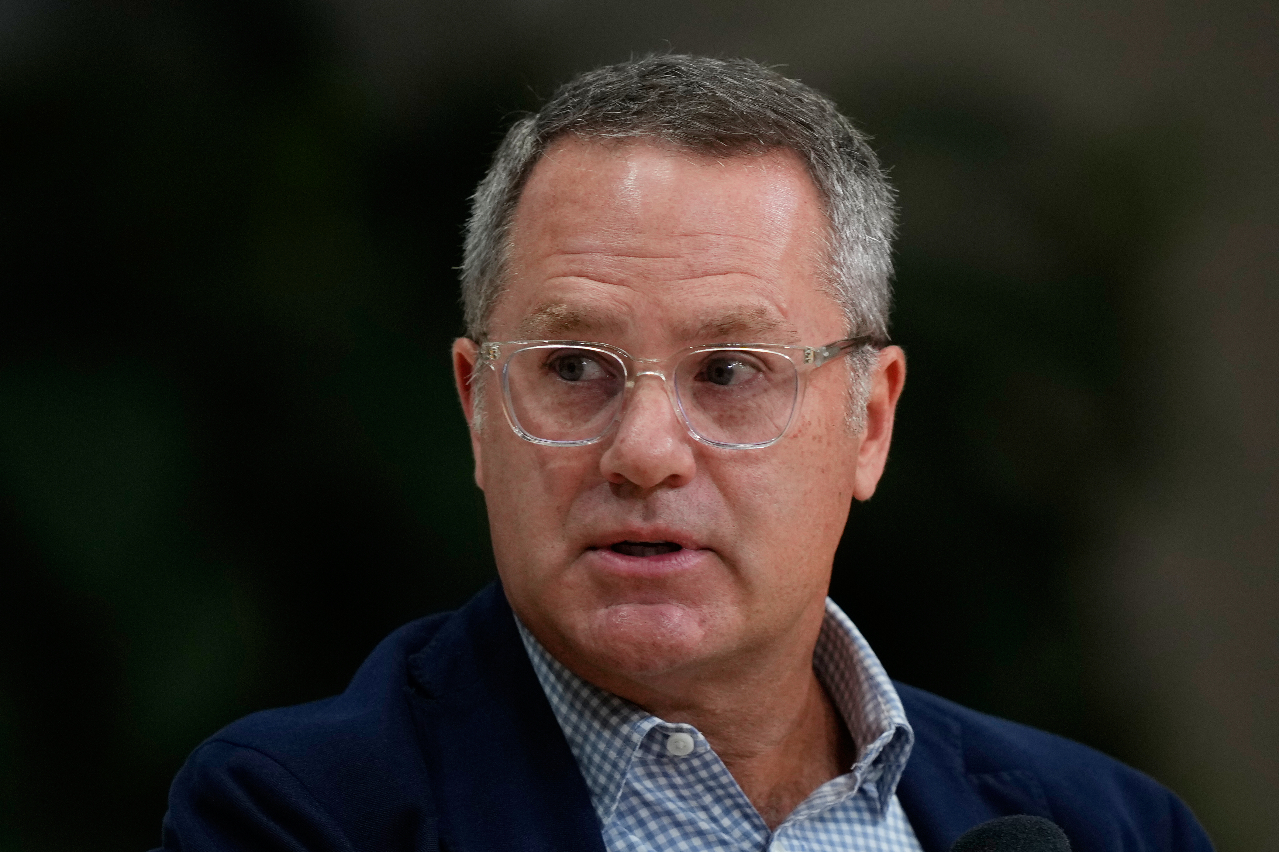 Walmart CEO Doug McMillon speaks at the Opportunity Summit, Sept. 25, in Bentonville, Ark. McMillon, who announced that he will step down on Jan. 31, 2026, on Friday, will be remembered for innovations and investments in e-commerce as company CEO.