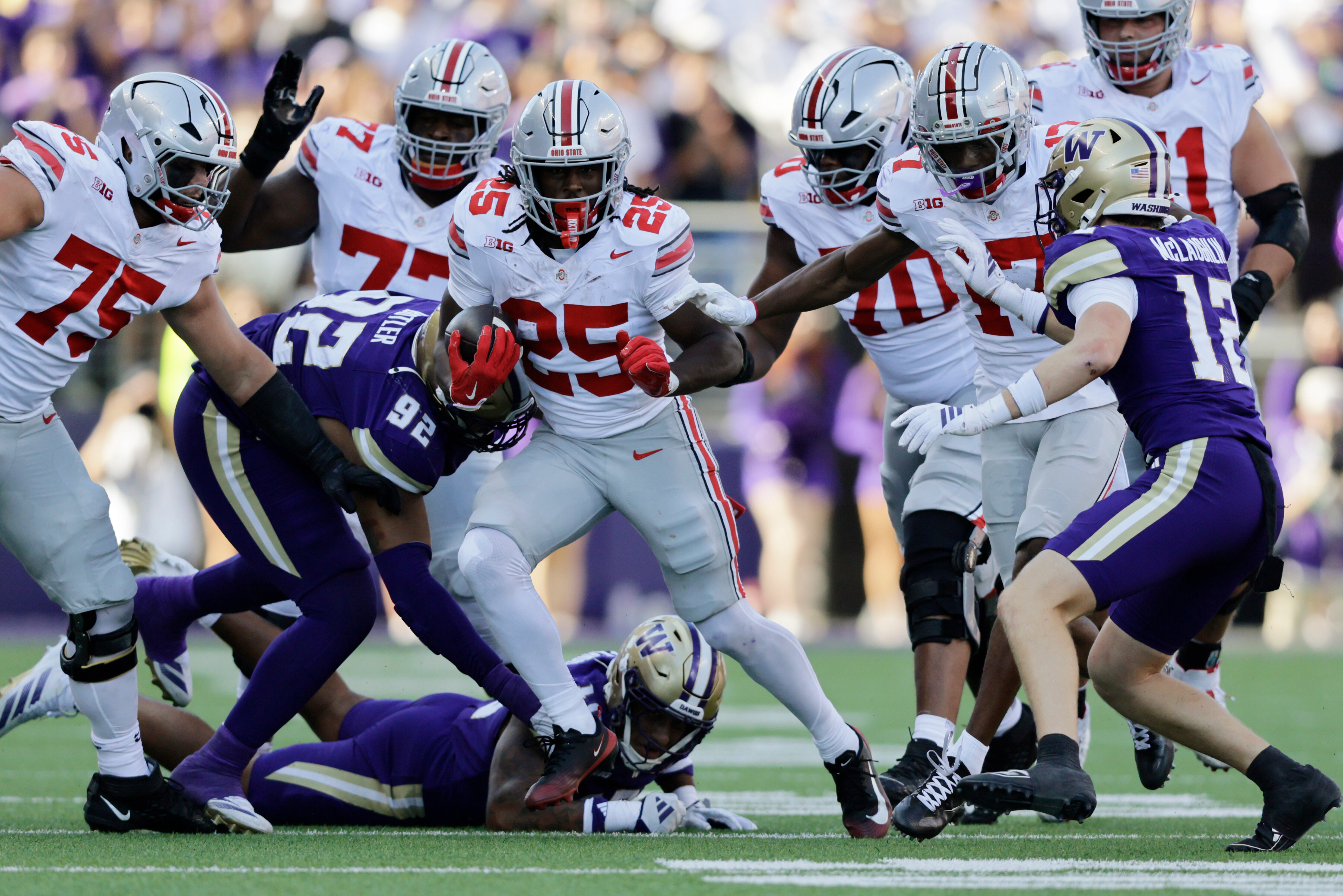 Ohio State running back Bo Jackson (25) carries the ball against the Washington during the second half of an NCAA college football game, Saturday, Sept. 27, 2025, in Seattle.