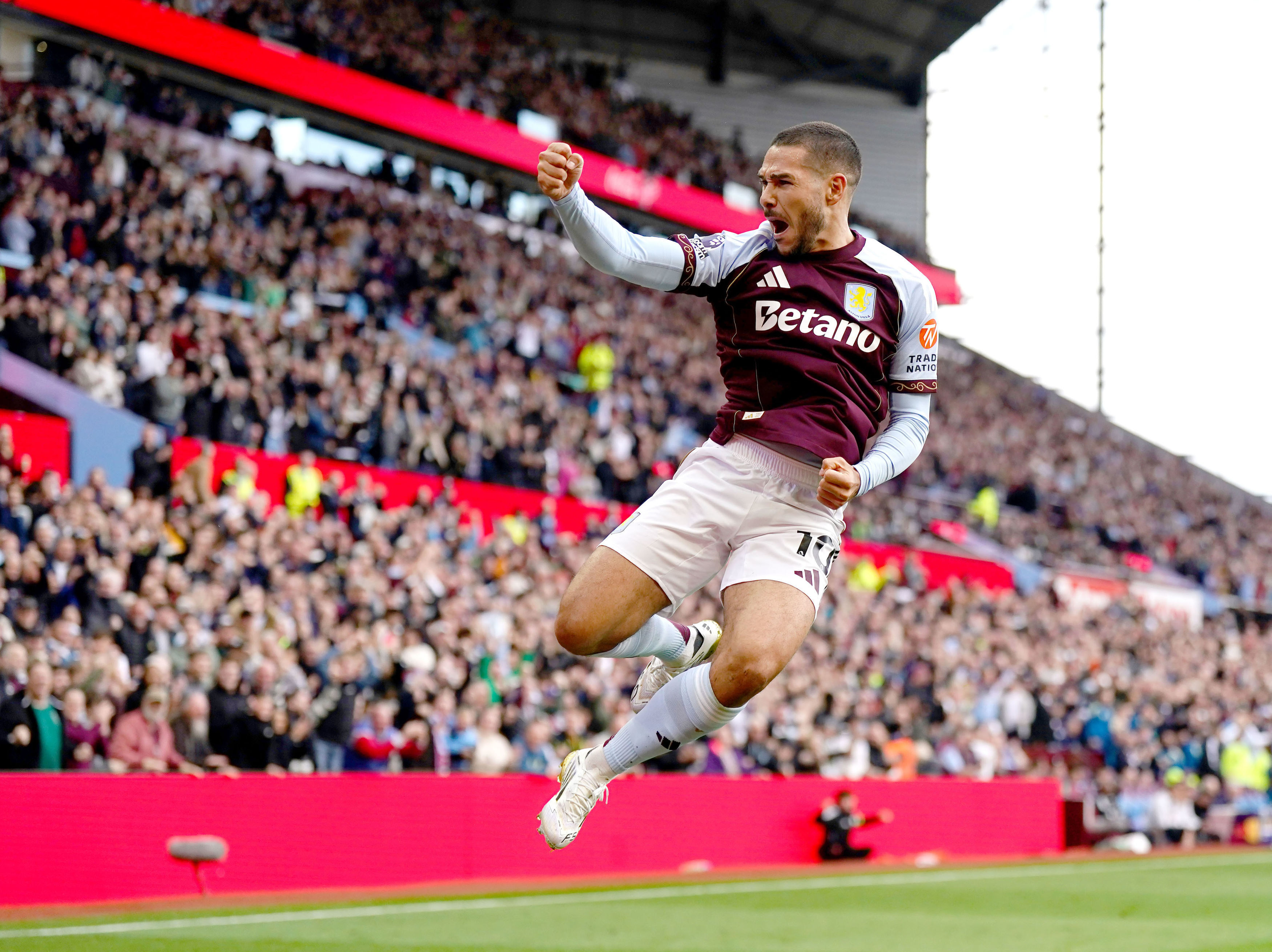 Aston Villa's Emi Buendia celebrates scoring his team's third goal during the English Premier League soccer match between Aston Villa and Fulham at Villa Park, Birmingham, England, Sunday, Sept. 28, 2025. 